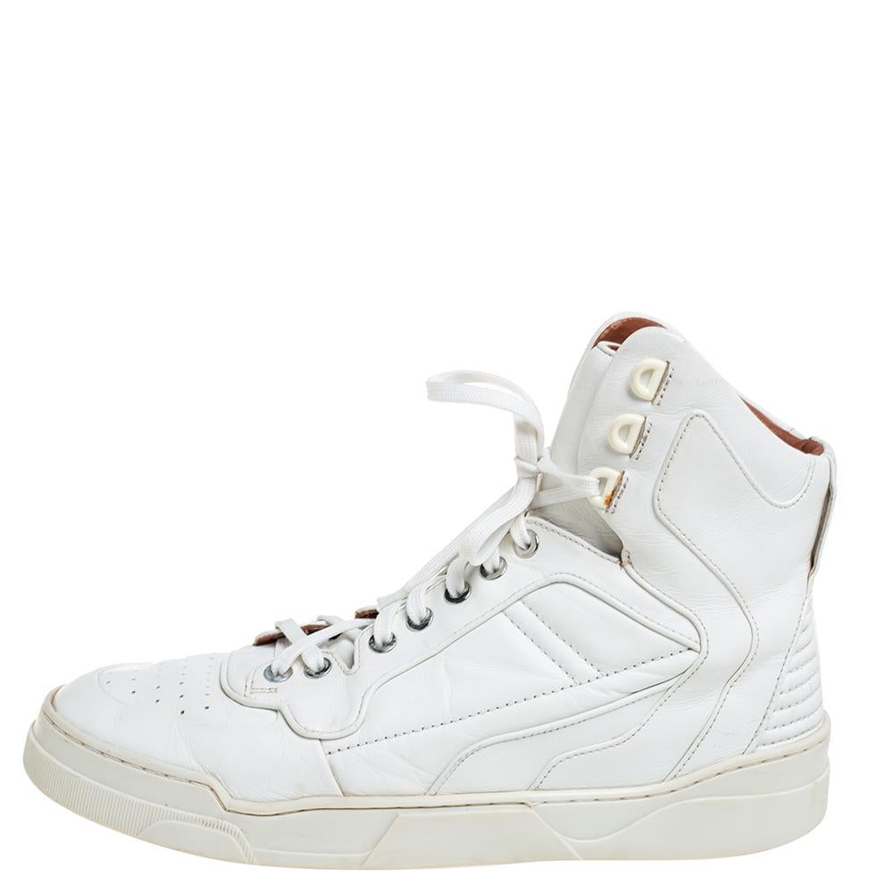 Create the most stylish sporty and casual looks with these Givenchy high-top sneakers. Crafted in leather in a white shade, this modern style features lace-up ties. With perforated accents at the uppers.

