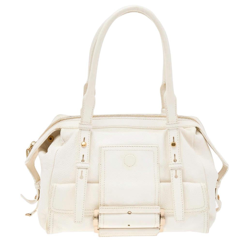 Flaunt the latest fashion with this Givenchy bag that is elegant yet trendy. This leather creation has shoulder handles and is accented with gold-tone hardware. Its fabric lined interior adds to its strength and durability. This radiant white