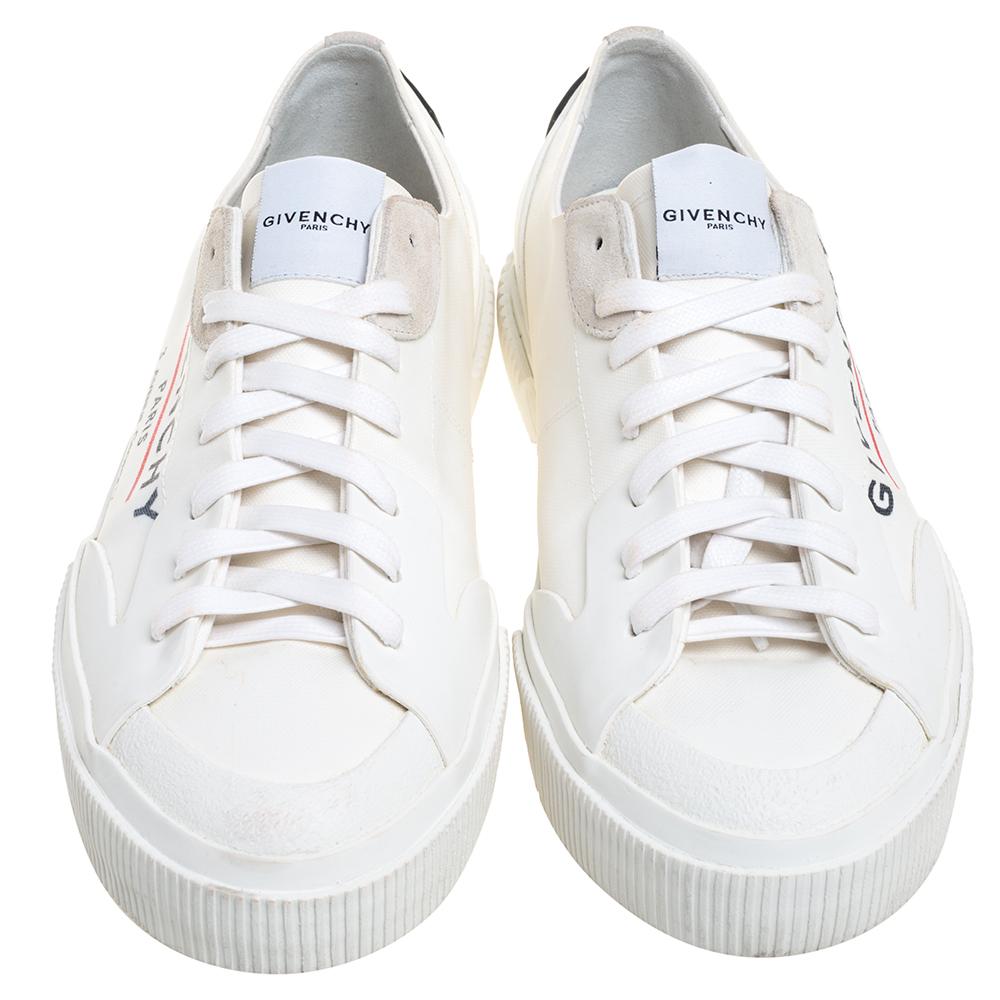 Step into these Givenchy sneakers for instant comfort! They feature the brand label on the white exterior, made from canvas, suede, and rubber. They flaunt round toes and lace-ups on the vamps. Pair these with casuals for a sporty and fashionable