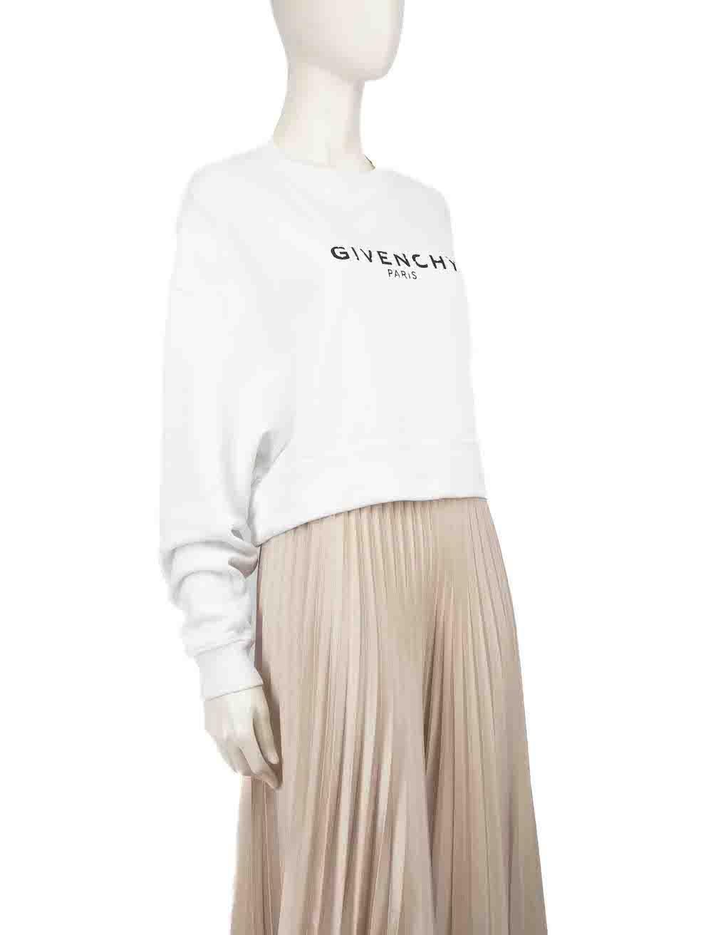 CONDITION is Good. Minor wear to sweatshirt is evident. Light discolouration to front hem, both sleeves, rear left side and neckline on this used Givenchy designer resale item.
 
 
 
 Details
 
 
 White
 
 Cotton
 
 Sweatshirt
 
 Cracked logo print