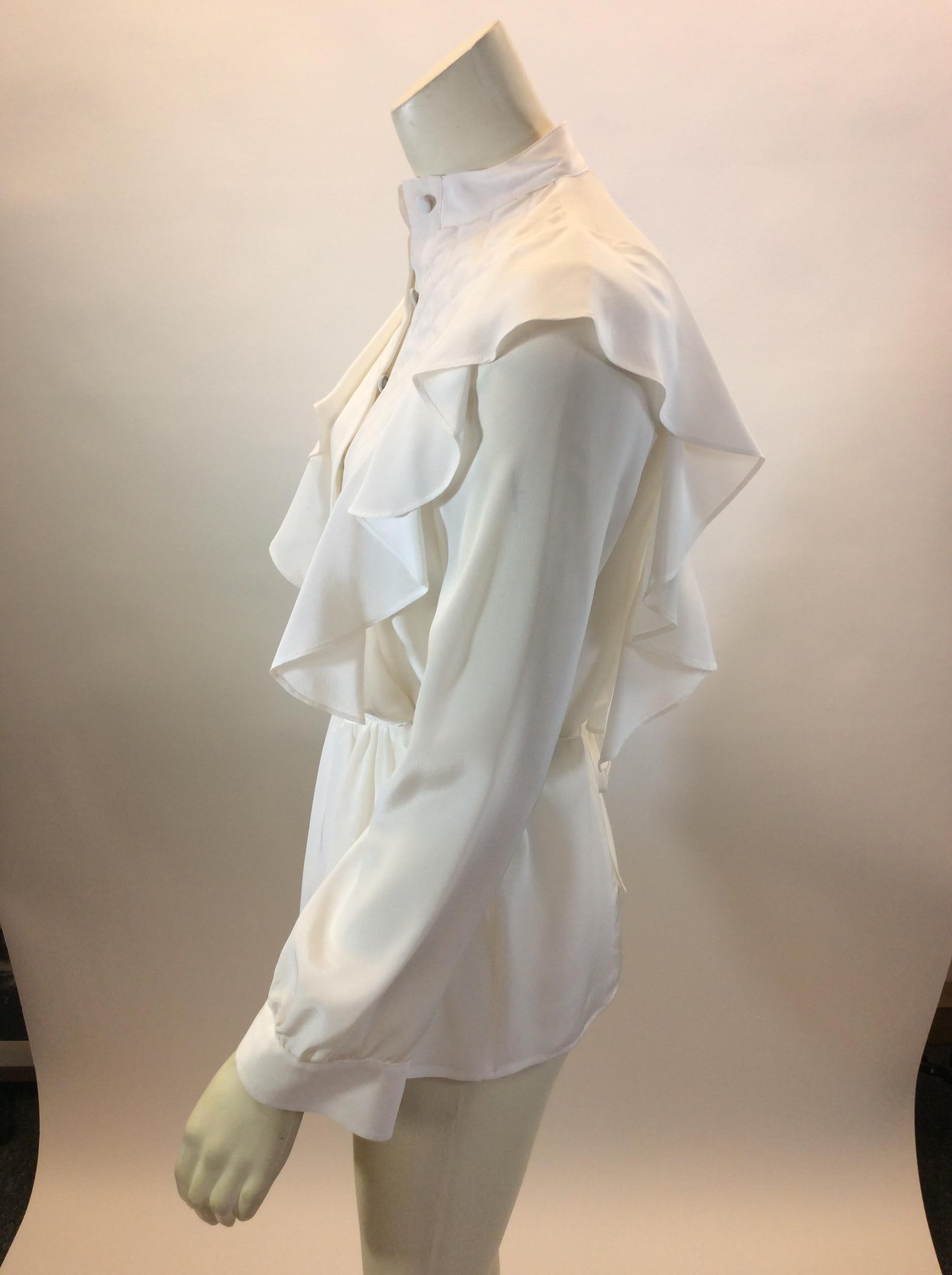 Givenchy White Silk Blouse
$199
Made in India
100% Silk
Size 36
Length 24.5