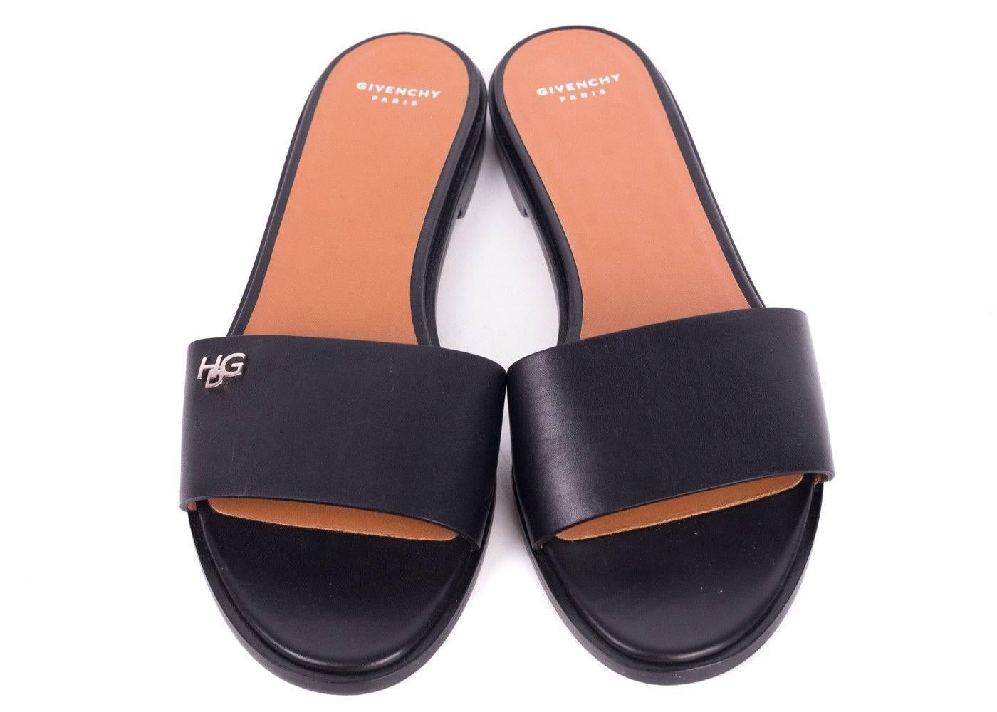 Strut in style with cool-chic elegance courtesy of Givenchy. This sandal is the ultimate minimalistic, long wearng slide. Featuring a simplistic design, highlighted by rich Italian leather and silver tone HDG symbol. Givenchy bridges this simple