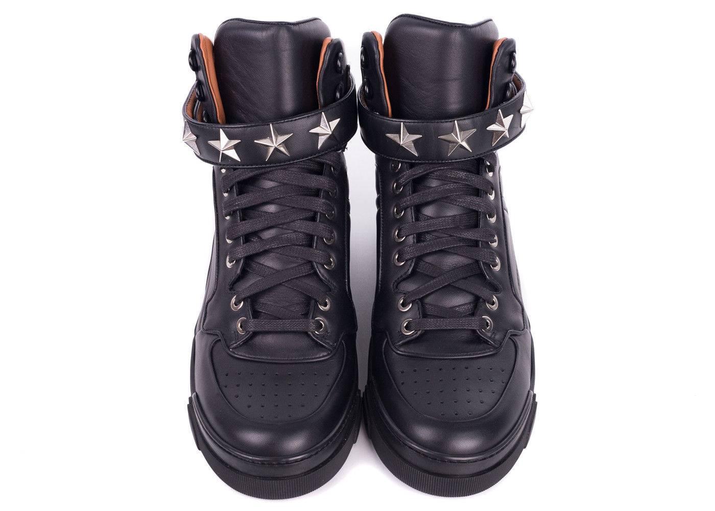 Givenchy's Tyson High Top Sneaker is this season's must have. This sneaker features Givenchy's signature star studded strap , pure genuine leather, and tonal black laces. You can pair these sneakers with leather pants and a moto jacket for a natural