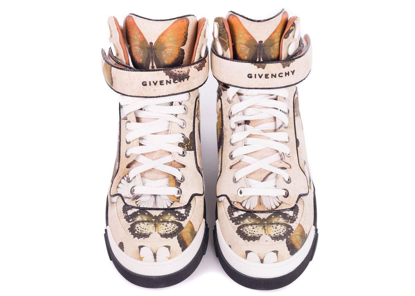 Givenchy's Tyson High Top Sneaker is this season's must have. This sneaker features Givenchy's Butterfly Print, pure genuine leather, and and rich black leather trimming. You can pair these sneakers with olive green leather pants and a moto jacket