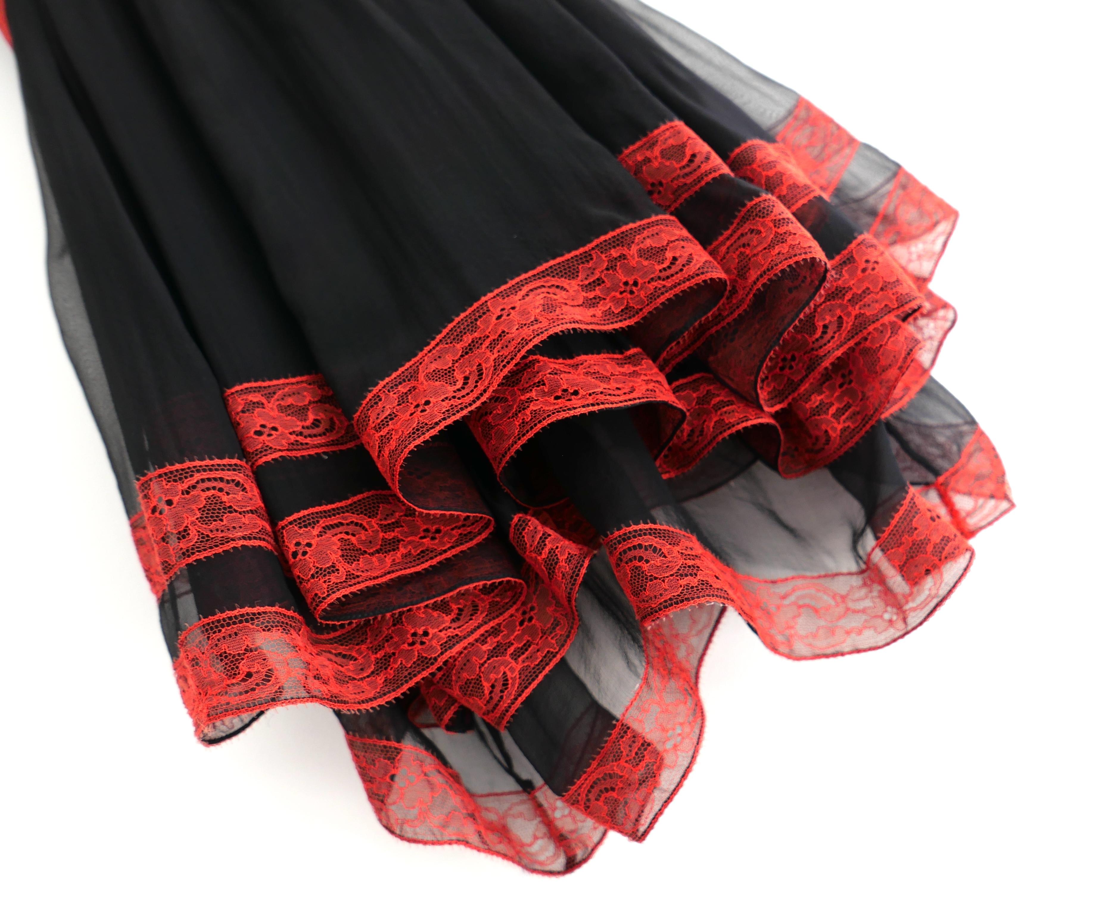Sexy and flirty Givenchy mini dress from Riccardo Tisci’s Resort 2011 collection - Look 7. Worn less than a handful of times. Made from semi sheer black silk chiffon with bright red lace edgings. It has a super fun, layered construction with halter