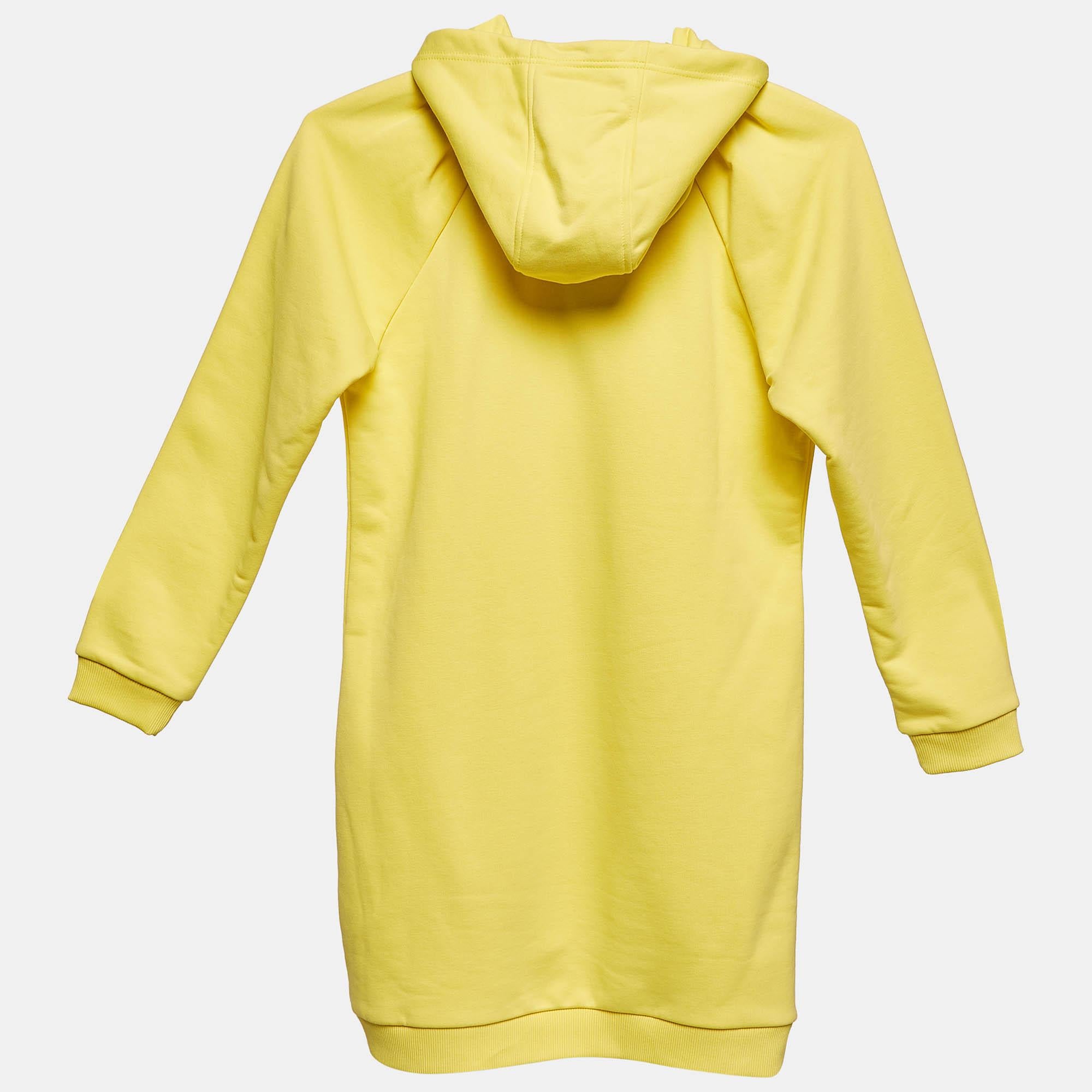 L'abito Givenchy offre un mix chic di comfort e stile per il tuo bambino. Realizzato in morbido cotone  presenta un logo ricamato in grassetto  aggiungendo un tocco di tendenza. Questo vestito vivace è perfetto per le giornate casual  assicurando