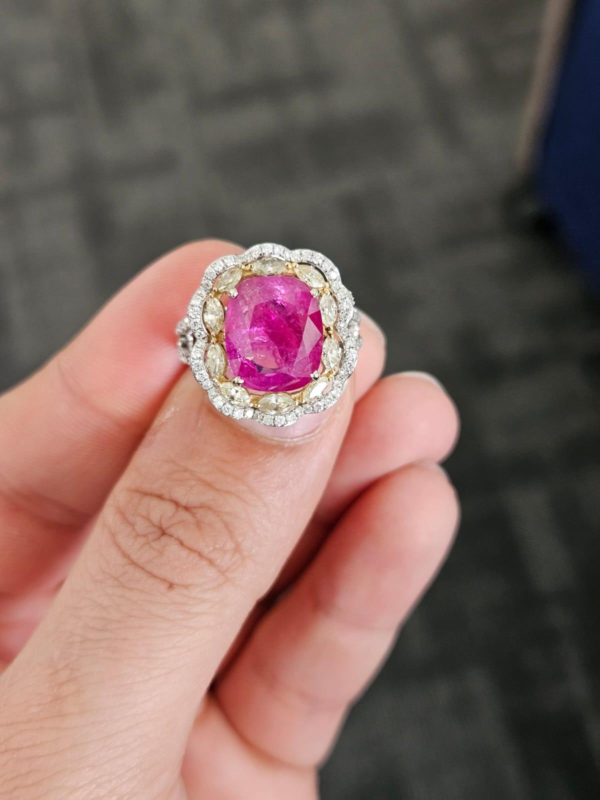 A very important and beautiful, Ruby Engagement/ Cocktail Ring set in 18K Gold & Diamonds. The weight of the Ruby is 6.24 carats. The Ruby is completely natural, without any treatment and is of Burmese origin. The combined Diamonds weight is 1.36