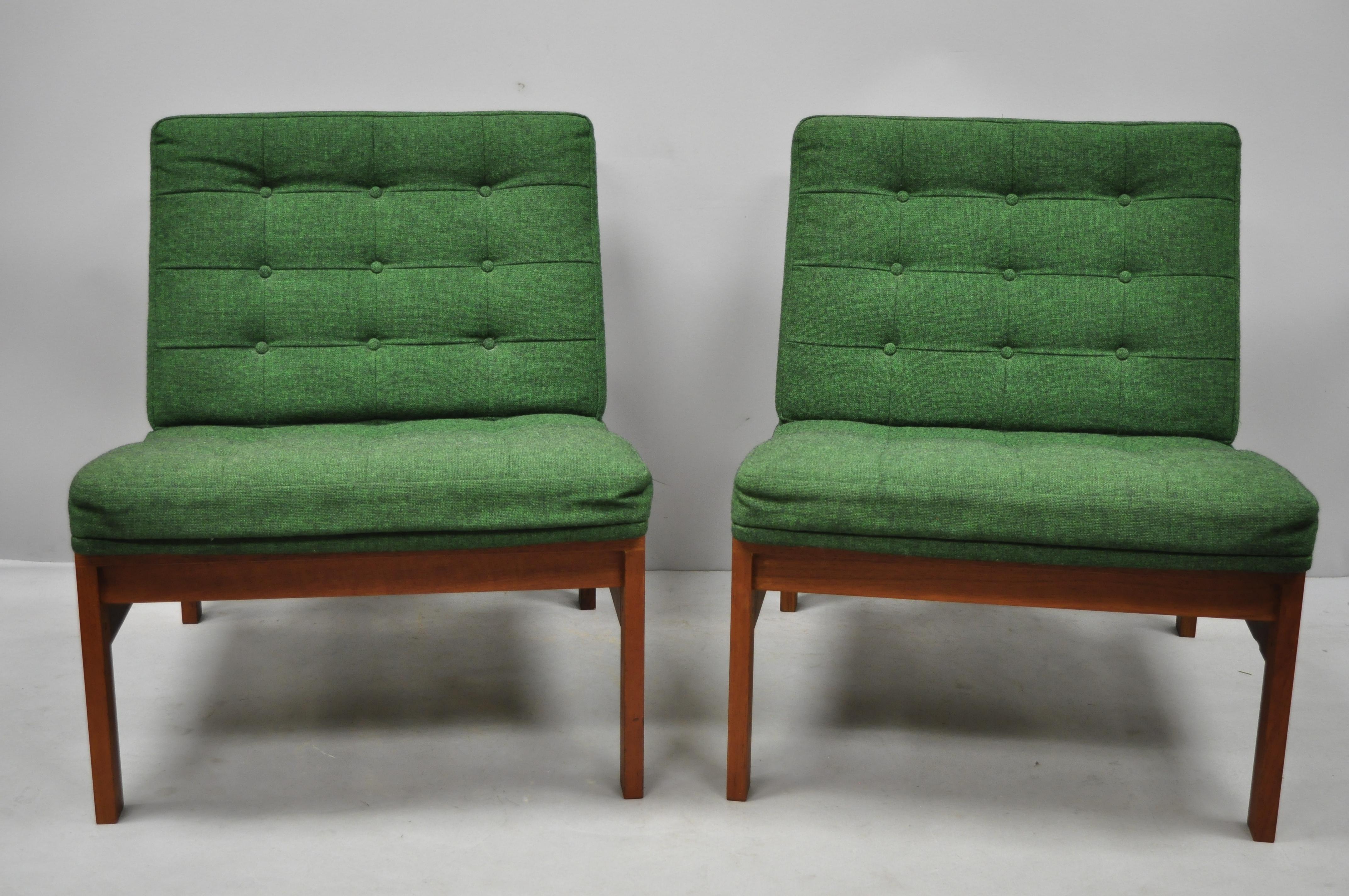 Pair of Gjerlov Knudsen & Torben Lind for France & Son green teak moduline slipper chairs. Items feature original green button tufted upholstery, exposed joinery, solid wood construction, beautiful wood grain, original label, clean modernist lines,