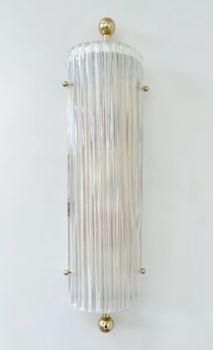 Italian wall light or flush mount shown in frosted Murano glass with polished brass details / Designed by Fabio Bergomi for Fabio Ltd / Made in Italy
2 lights / E12 or E14 type / max 40W each 
Height: 23 inches / Width: 5.5 inches / Depth: 3