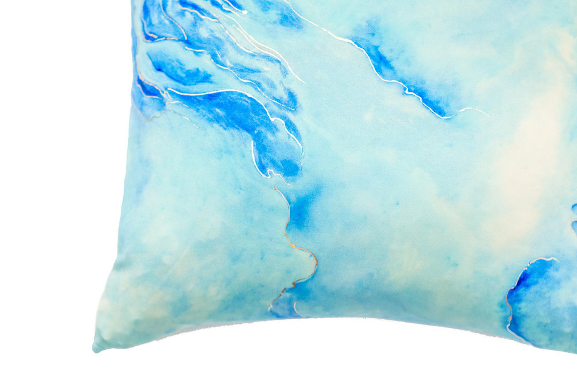Diverse in beauty, glacier inspires hand-painted expression in desaturated hues. Rippling ice and water flows fill the space as the pillow brings to life the twinkle and beauty of ancestral snowy valleys.

Available in a variety of vibrant colors