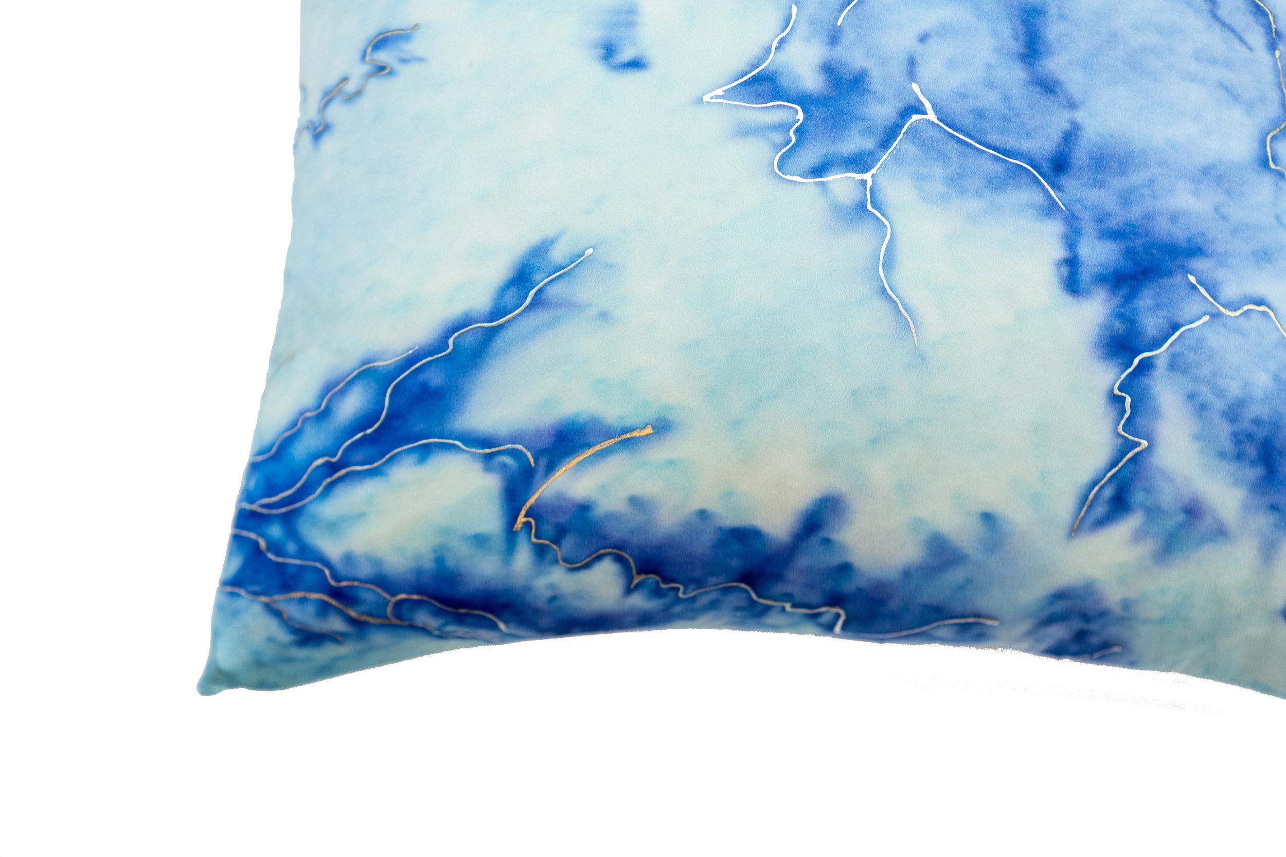 With lustrous natural silk this nature-inspired pattern celebrates the delicate and fluid flow of glaciers. The design was inspired by photographer Francis Augustine who captured snowy valleys, from the sky.

Available in a variety of vibrant