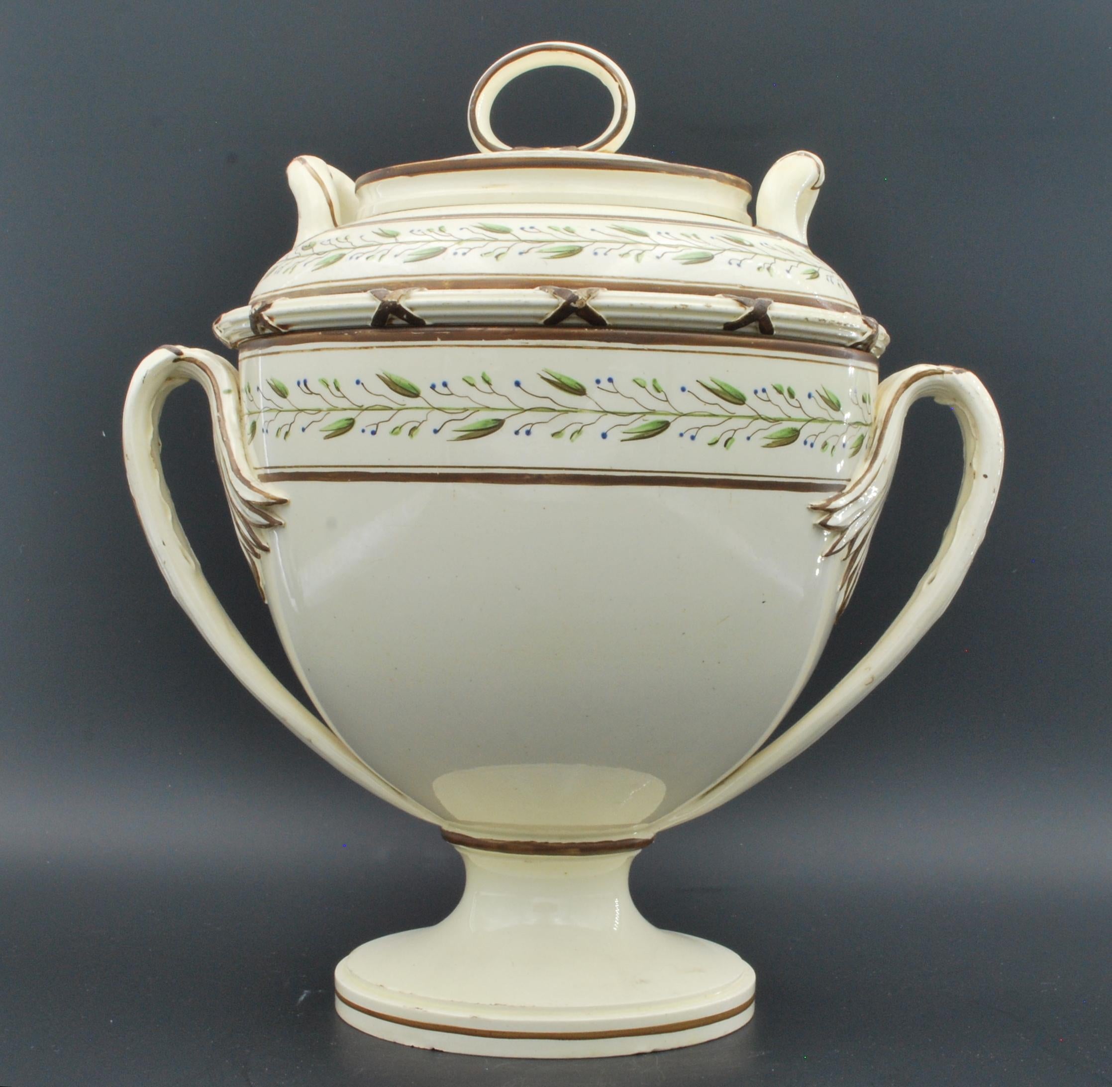 An important four-piece glacier, or fruit cooler, in creamware with freehand painted decoration. Ice was put into the upper and lower sections to keep the contents cool.