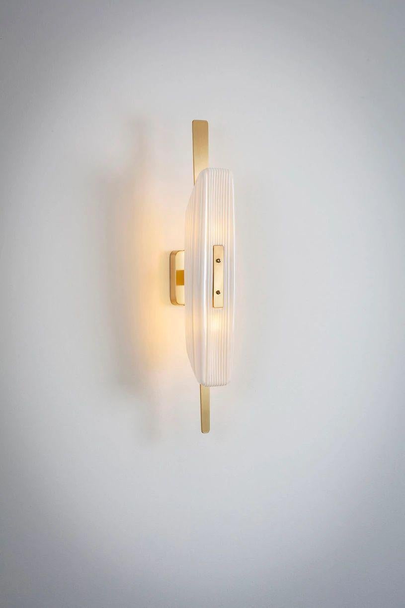 Glaive wall light single by Bert Frank
Dimensions: 10 x 8 x 50 cm
Materials: Brass, Bone China


All our lamps can be wired according to each country. If sold to the USA it will be wired for the USA for instance.

When Adam Yeats and Robbie