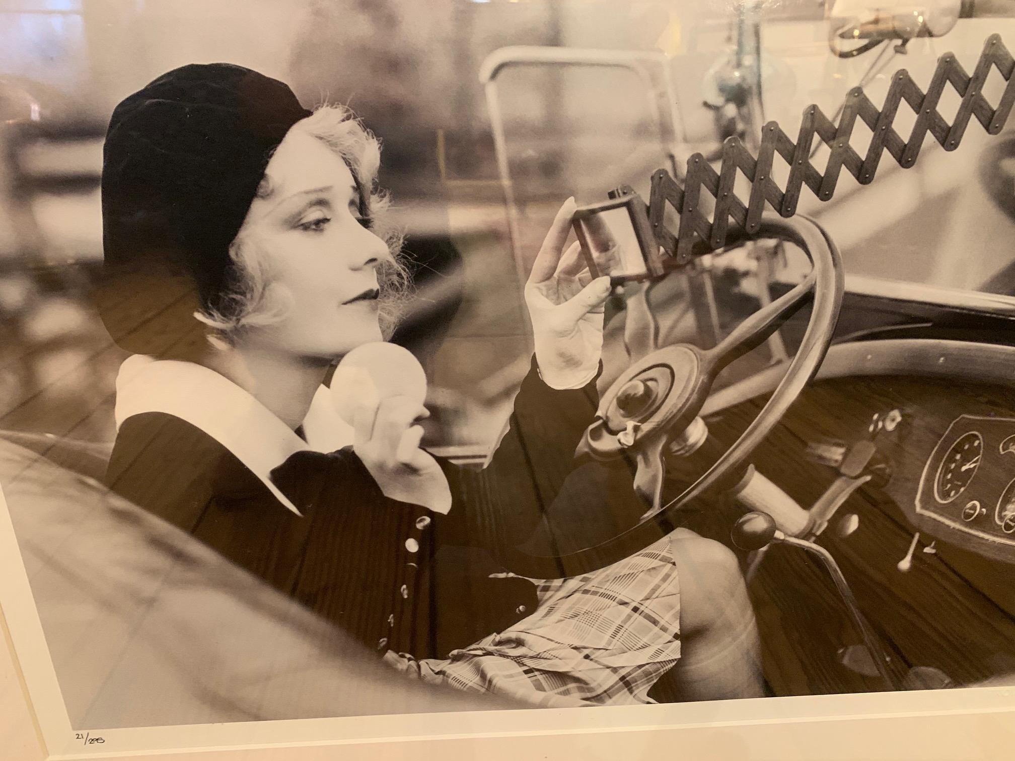 Big beautiful black and white photograph of glamorous Hollywood moviestar Anita Page putting make up on in a glitzy convertible. Limited edition.

Note: Other glam moviestar photos are available that make a great grouping.