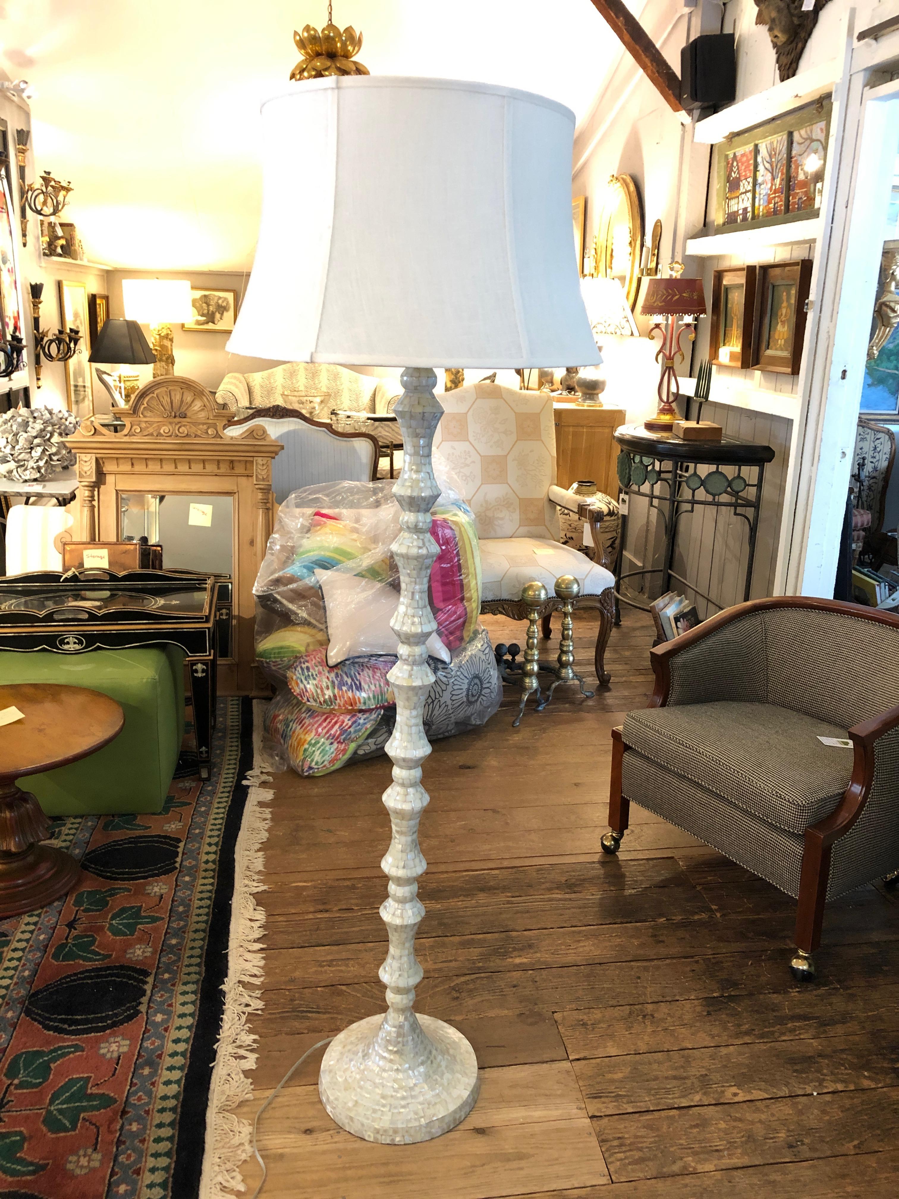 A beautiful tessellated stone mosaic floor lamp in lovely off white shimmering color, tall and statuesque. Custom shade. Column itself is 52.25 height base is 12