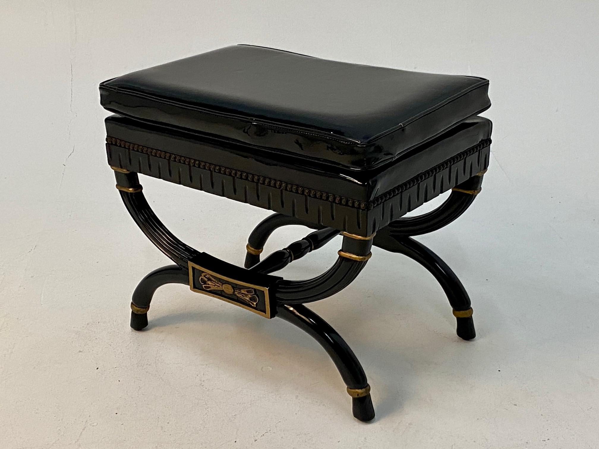 Schnazzy rectangular Regency style ebonized & giltwood ottoman bench with original black patent leather upholstery.
