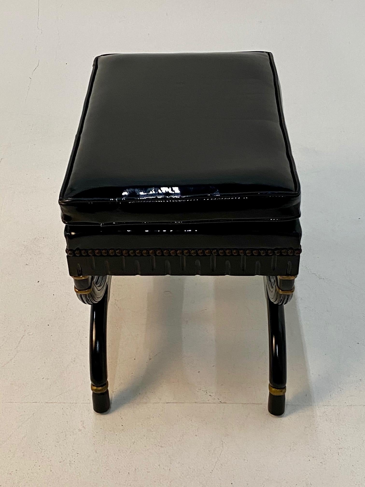 North American Glam Regency Style Ebonized & Giltwood Ottoman with Patent Leather Upholstery