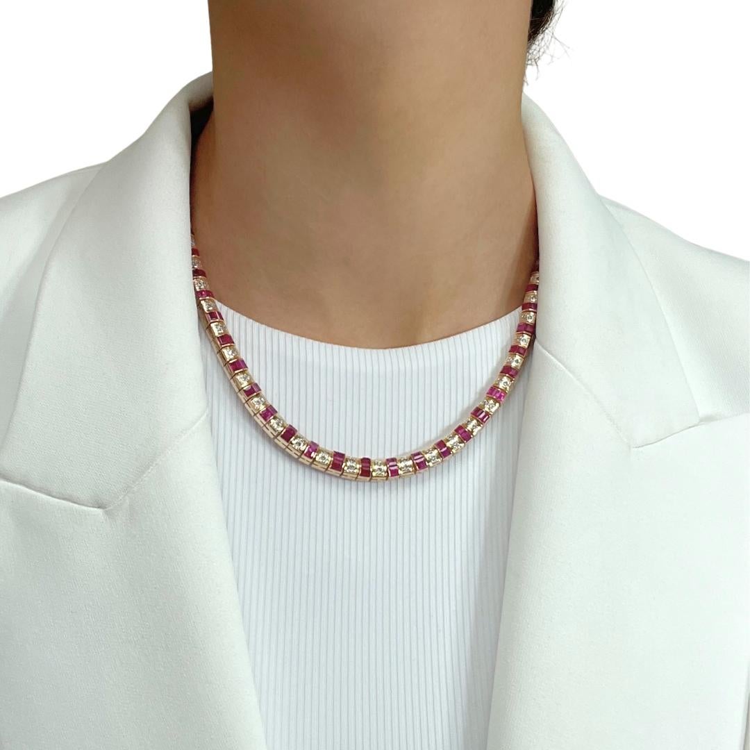 Glamorous 11.8ct Rubies and Diamonds Necklace in 14k Yellow Gold - IGI Certified

Embrace the allure of vibrant color with this 14k yellow gold necklace, adorned with 54 stunning baguette-cut rubies totaling 11.02 carats. Each ruby boasts a