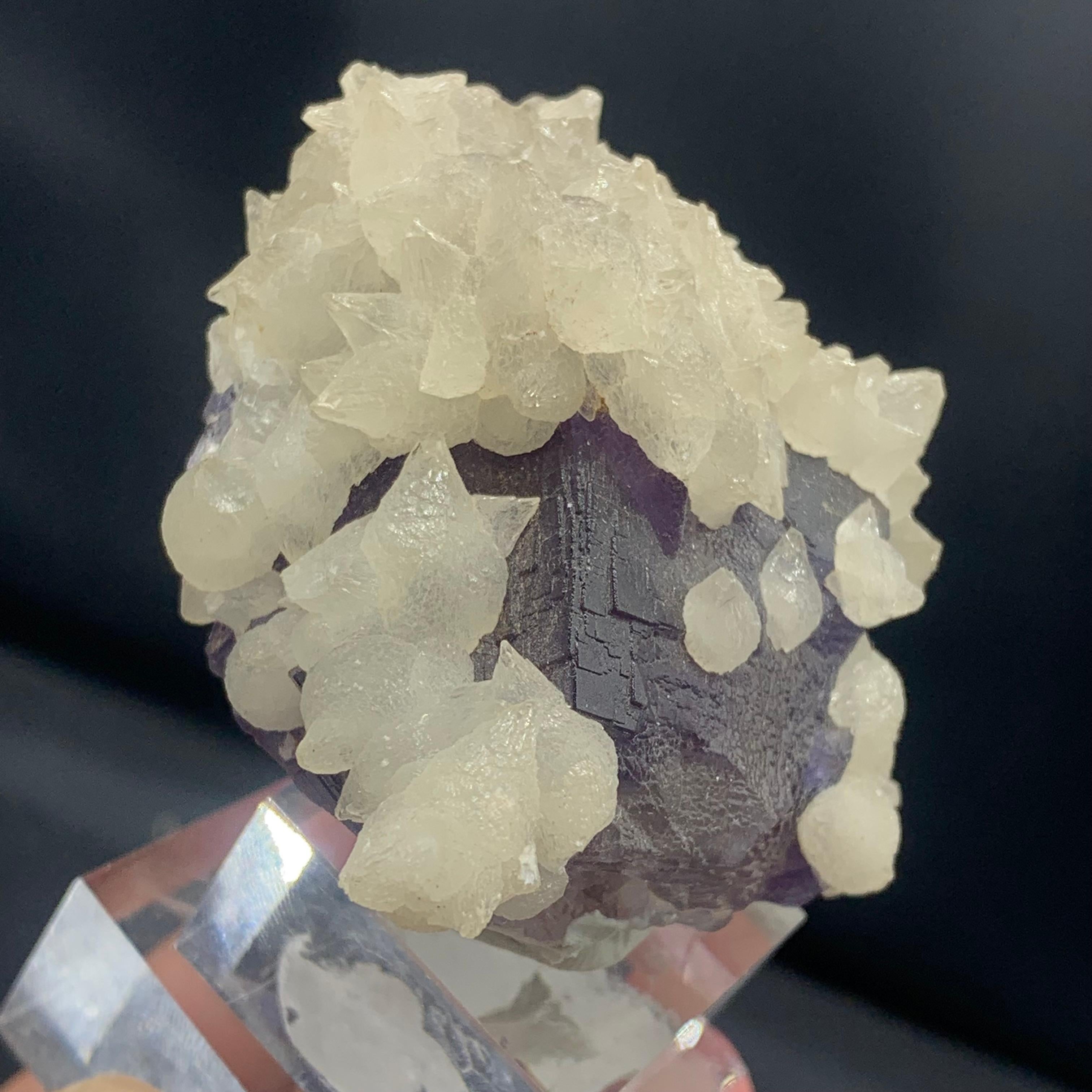 Glamorous Fluorite specimen with dog tooth from Pakistan 
WEIGHT: 162.08 grams
DIMENSIONS: 5.9 x 5.6 x 3.4 Cm
ORIGIN : Pakistan
TREATMENT None

The Fluorite meaning comes from the Latin word for flux, referring to the gems ability to flow in