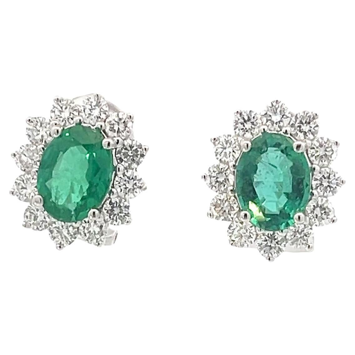 **Glamorous 18K Gold Emerald and Diamond Halo Earrings**