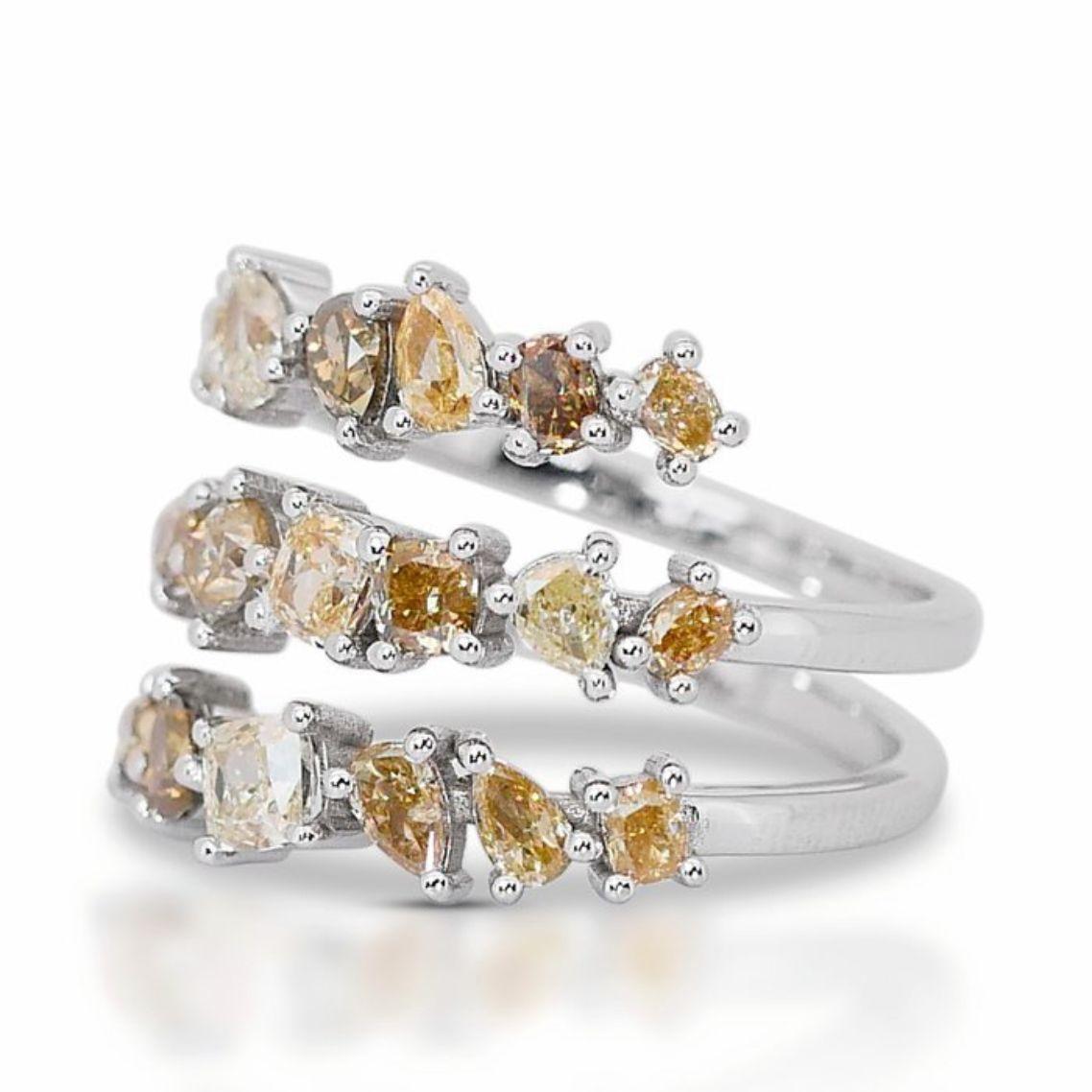 This captivating ring isn't just a piece of jewelry; it's a vibrant celebration of color and unique beauty. As the centerpiece, seven mesmerizing cushion-cut diamonds, totaling 1.3 carats, captivate your gaze with their light yellow warmth. The