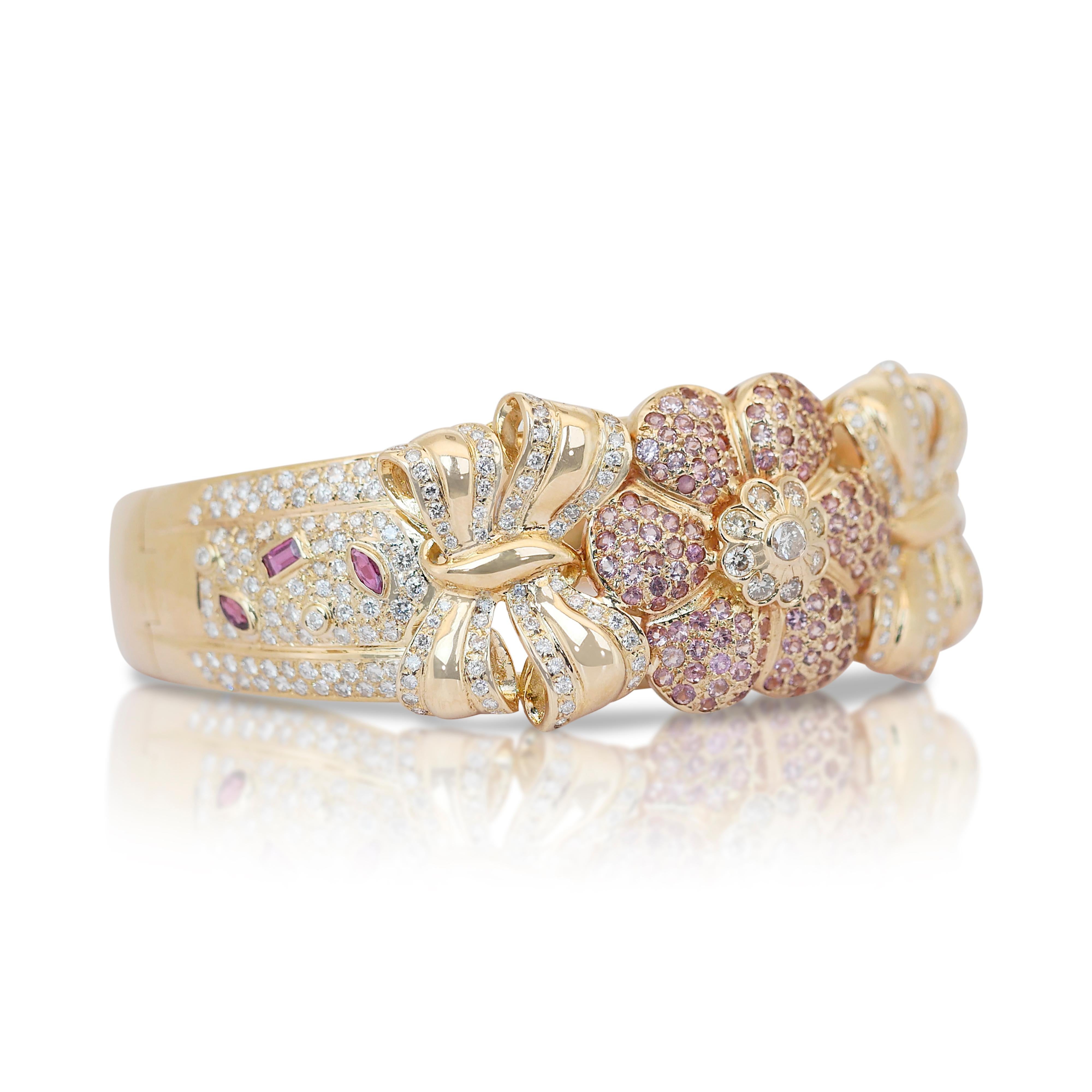 Glamorous 6.23ct Diamond Bracelet in 18k Yellow Gold - IGI Certified

This exquisite bracelet, crafted in 18K yellow gold, is a stunning showcase of vibrant gemstones. Featuring 126 round-cut pink sapphires totaling 2.12 carats, their vivid hue is