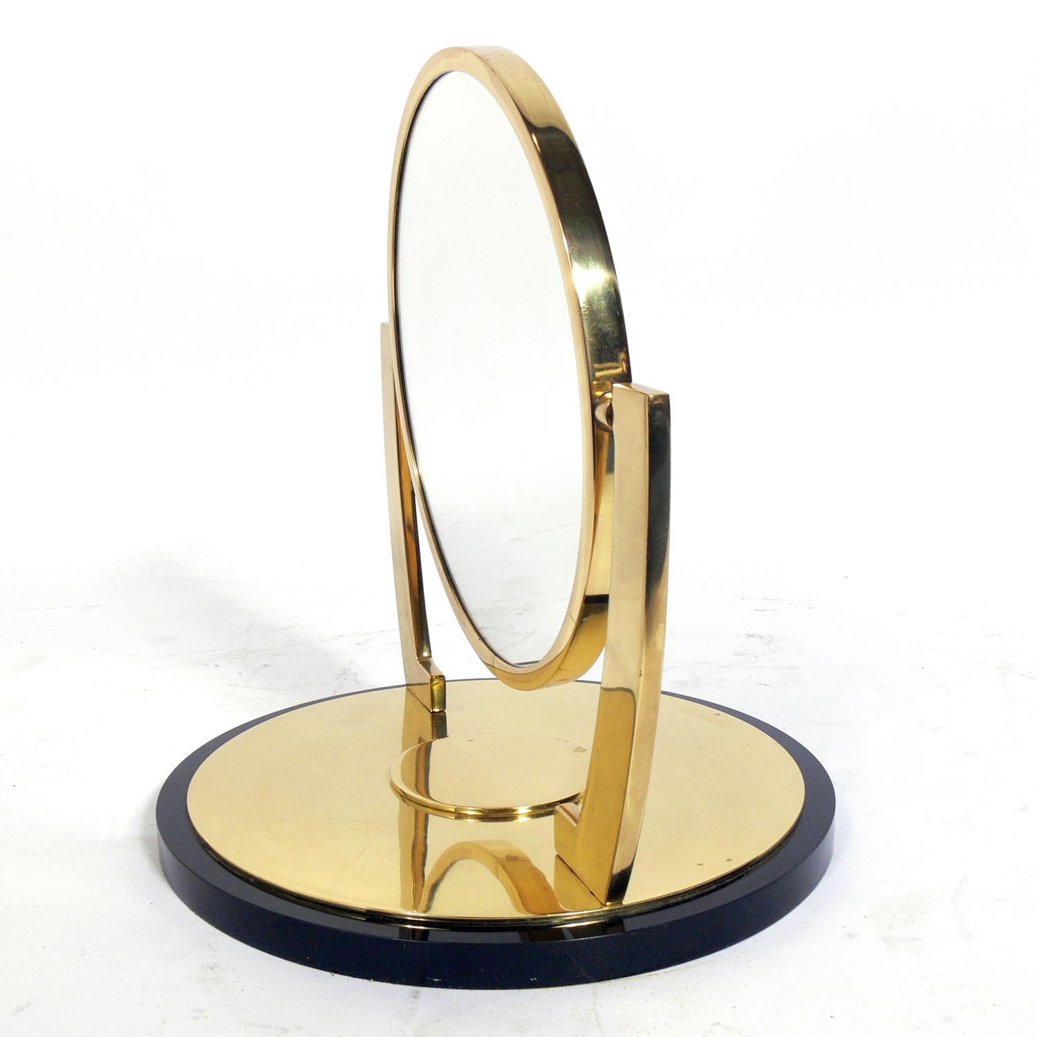Glamorous brass vanity or table mirror, in the manner of Karl Springer, American, circa 1970s.