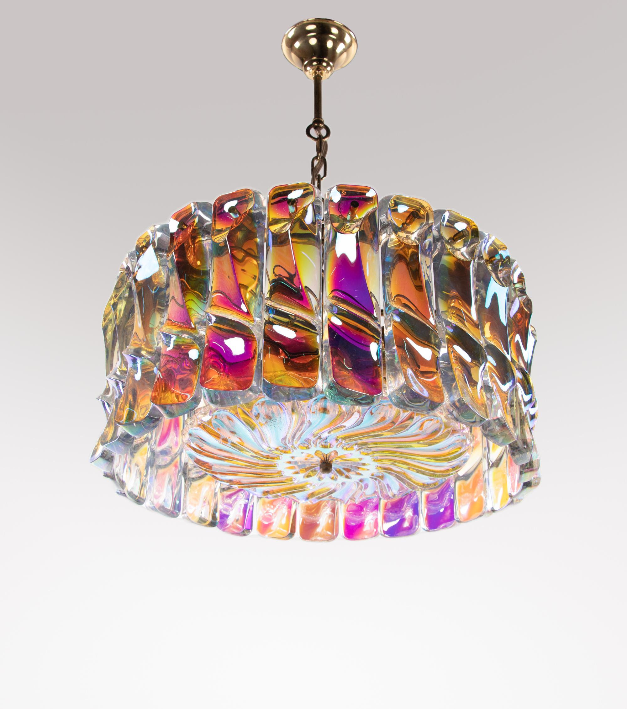 Glamurous and heavy chandelier with thick, handblown iridescent glass rectangles hanging from brass frame.

Measures: diameter 18