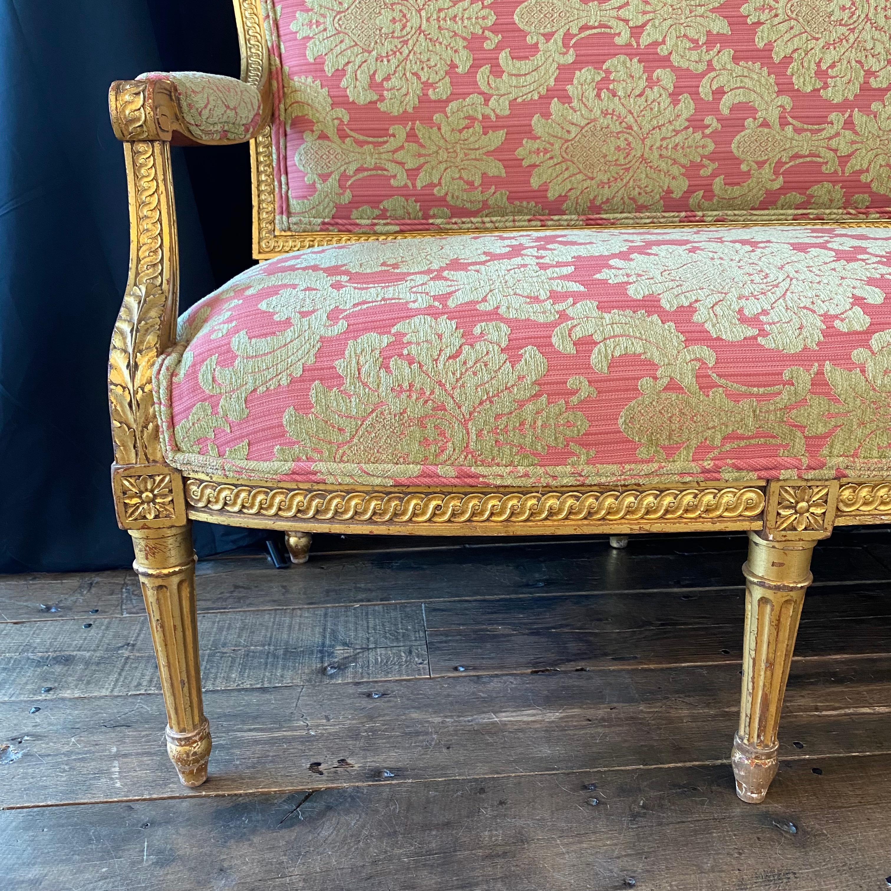 Glamorous French Louis XVI Style Gold Giltwood Sofa with Damask Upholstery In Good Condition For Sale In Hopewell, NJ