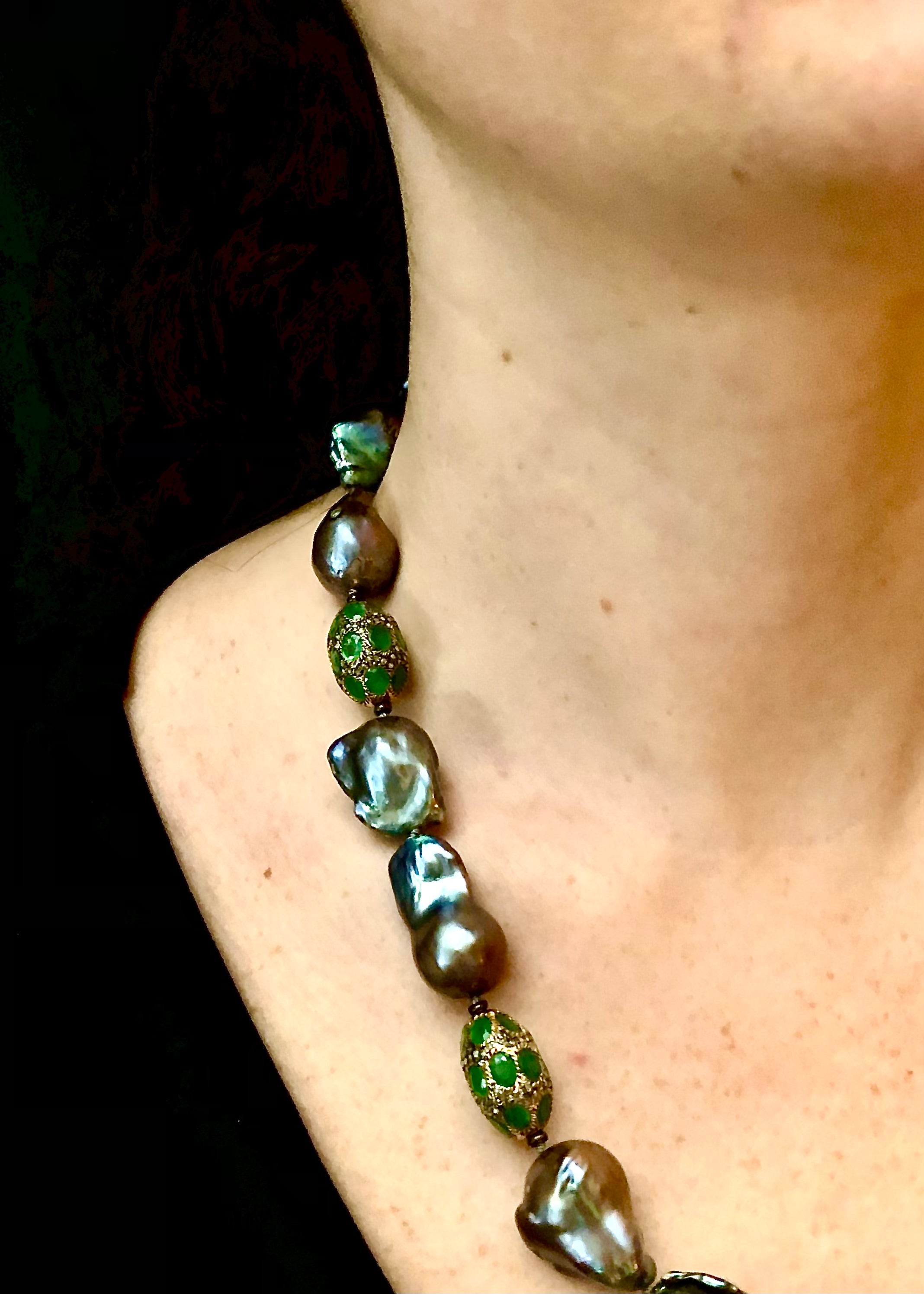 Glamorous freshwater peacock pearls w/ sliced diamonds and emeralds necklace For Sale
