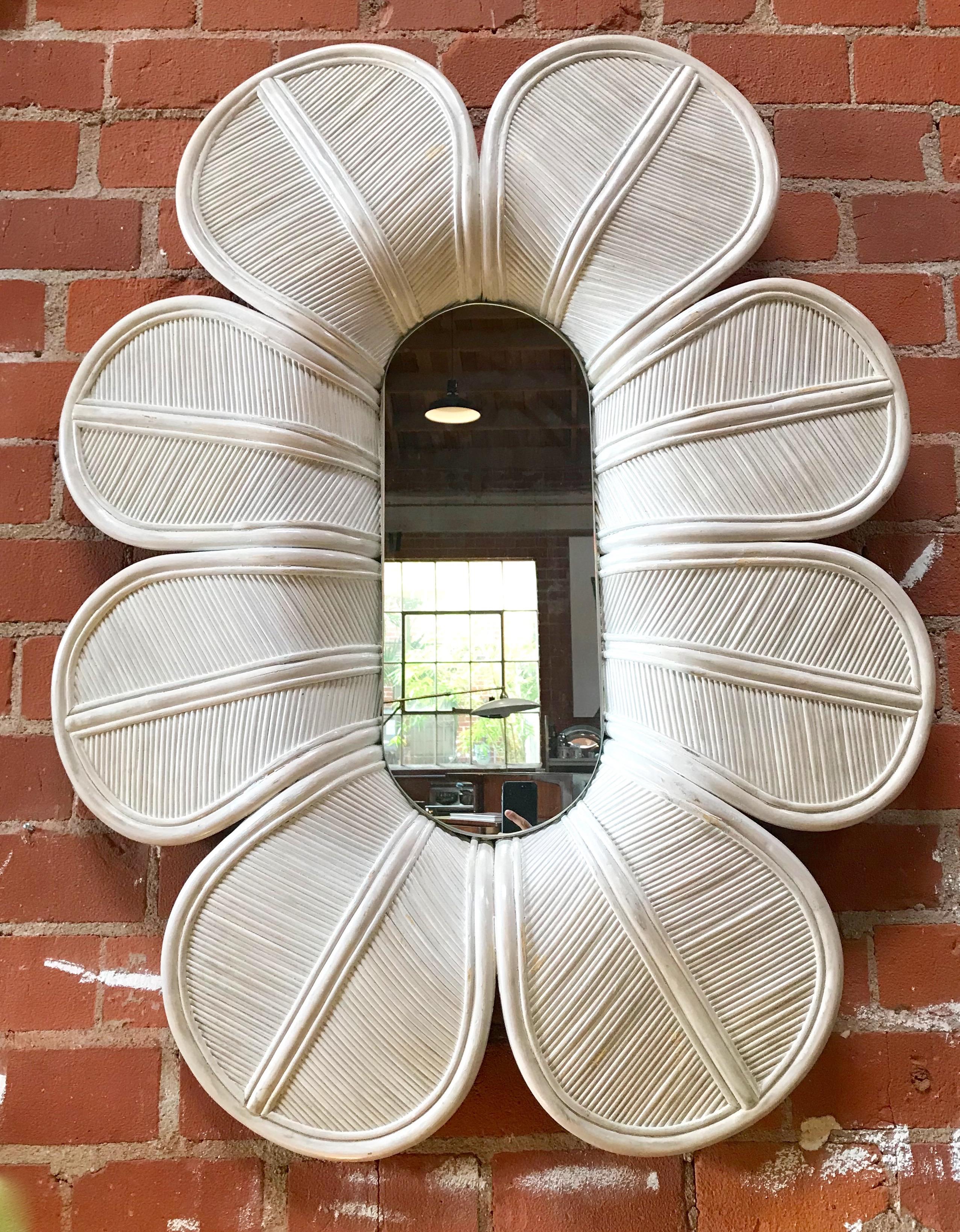 Giant flower wall mirror, Italy 1960s
Glamorous oversized midcentury bamboo wall mirror in the shape of a flower, circa 1960s. 
This sculptural artisan factory 