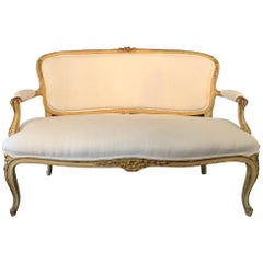 Antique Glamorous Giltwood Fancy French Sofa with New White Linen Upholstery