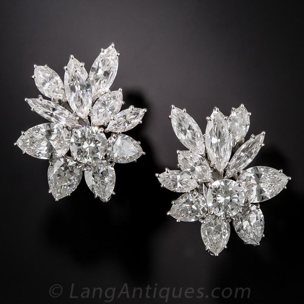 A red carpet must have! These sensational sparklers contain 8 carats of bright white, high-quality diamonds in EACH earring (16 carats total). The classic overlap design centers on a fine round brilliant cut diamond wrapped with both pear and