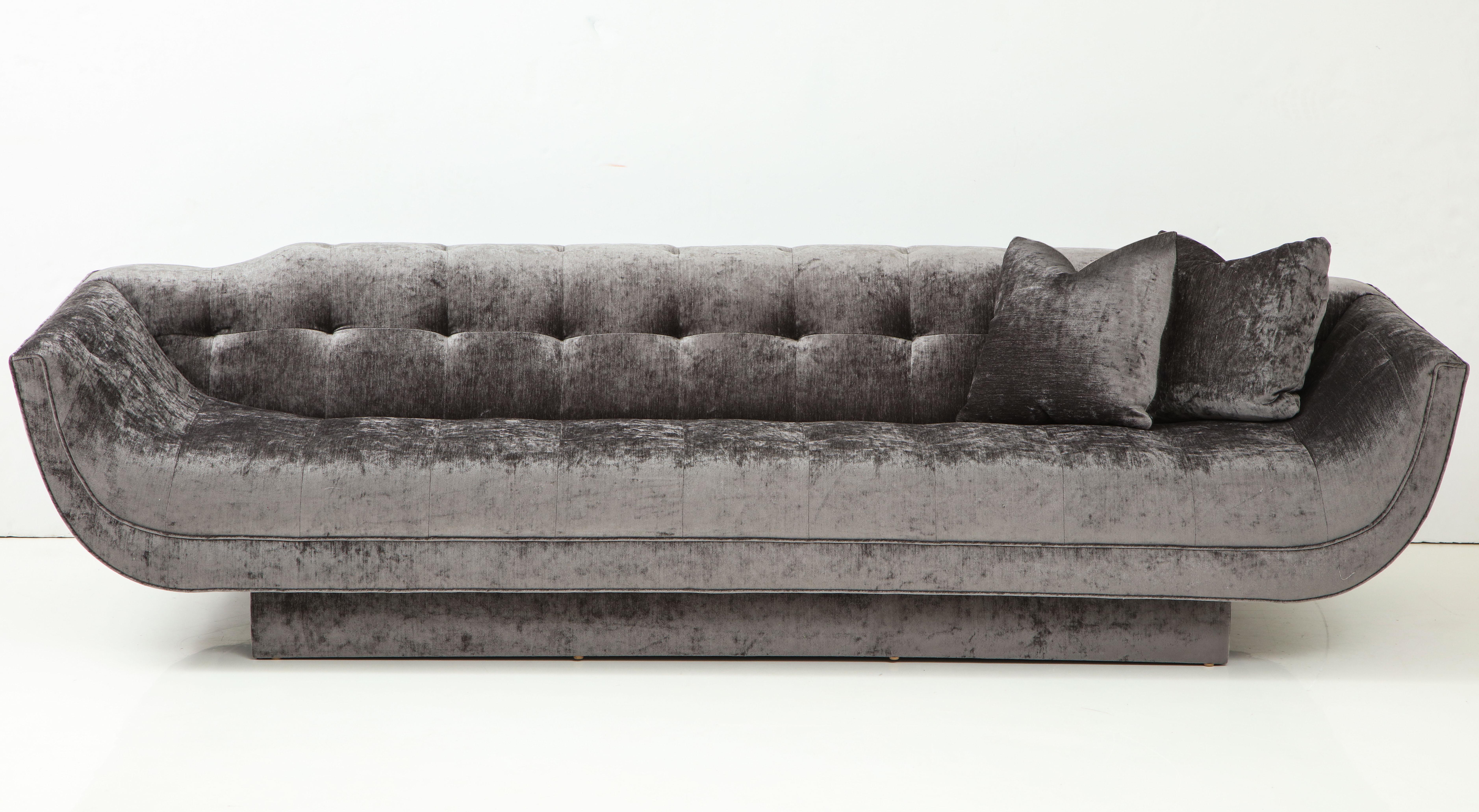 Glamorous Hollywood Regency style sofa by Adrian Pearsall.
The sofa has been beautifully reupholstered in a luxurious
grey chenille velvet fabric.