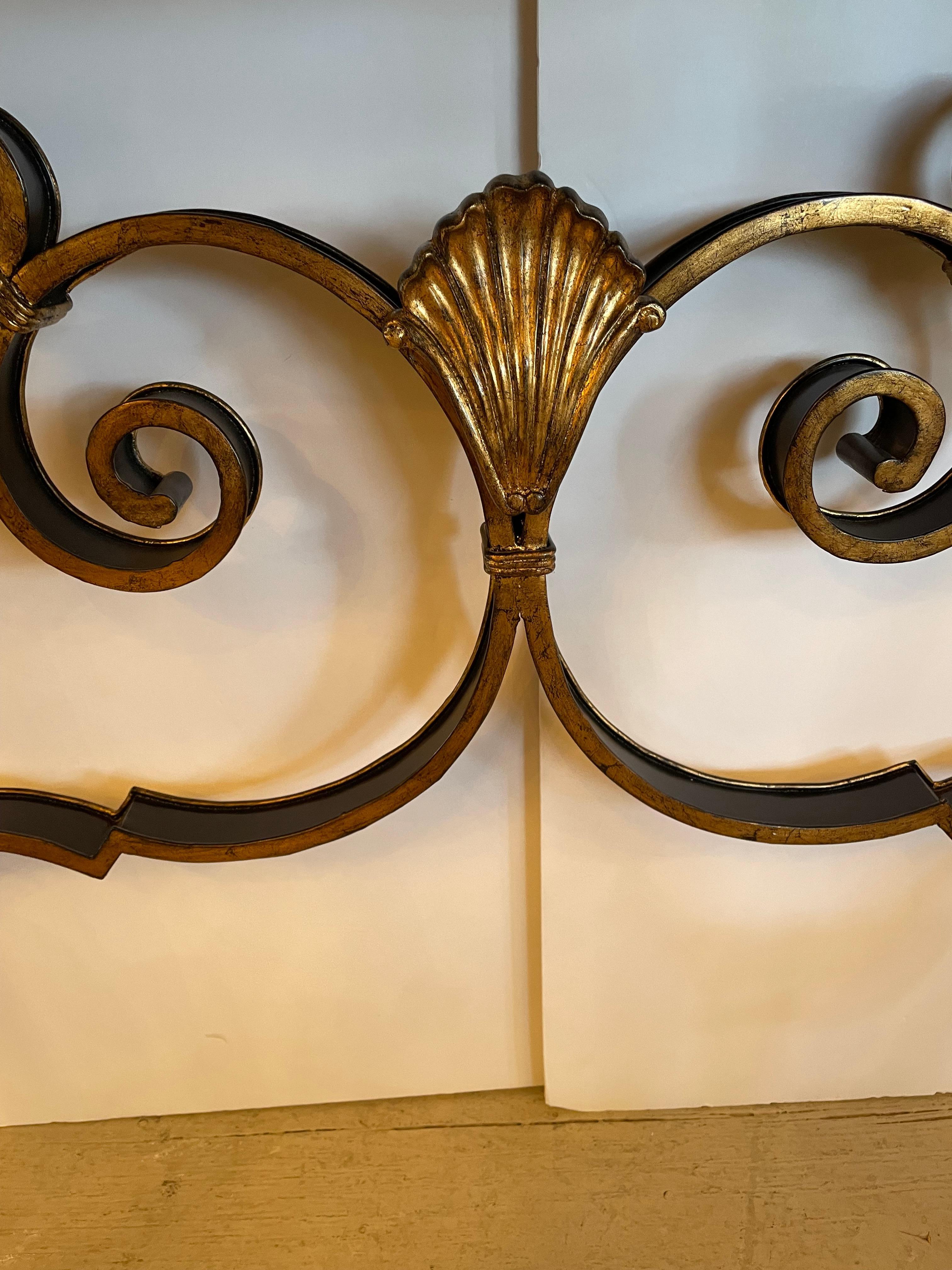 Late 20th Century Glamorous Large Black & Gold Hollywood Regency Iron Console with Aged Mirror Top For Sale