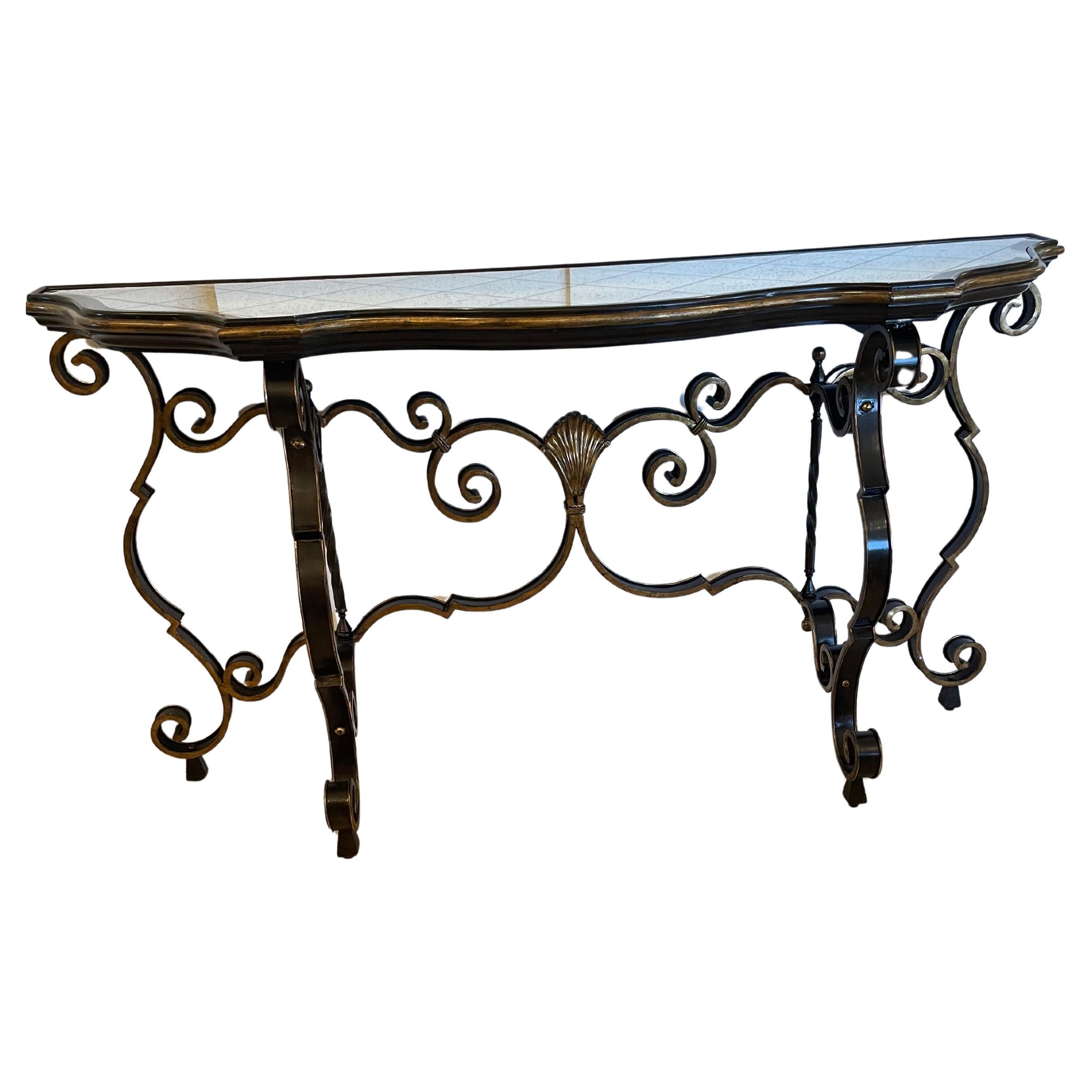 Glamorous Large Black & Gold Hollywood Regency Iron Console with Aged Mirror Top For Sale