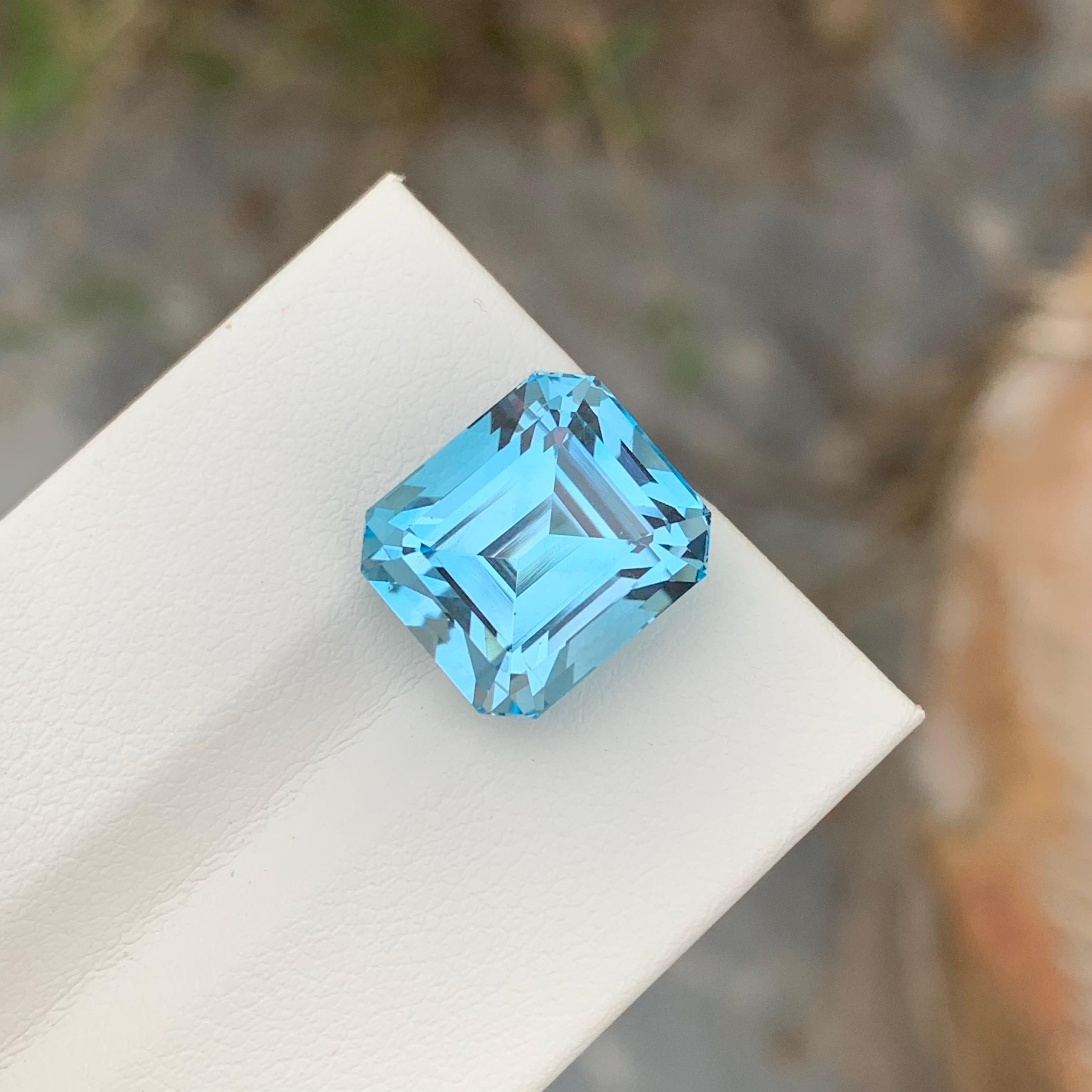 Loose Blue Topaz
Weight: 13.10 Carats
Dimensions: 12.9 x 11.2 x 9.6 Mm
Origin: Brazil
Shape: Asscher 
Color: Blue
Treatment: Non
Certificate: On Demand
Benefits Of Wearing Blue Topaz Stone:
It helps to improve communication and self-expression.
It