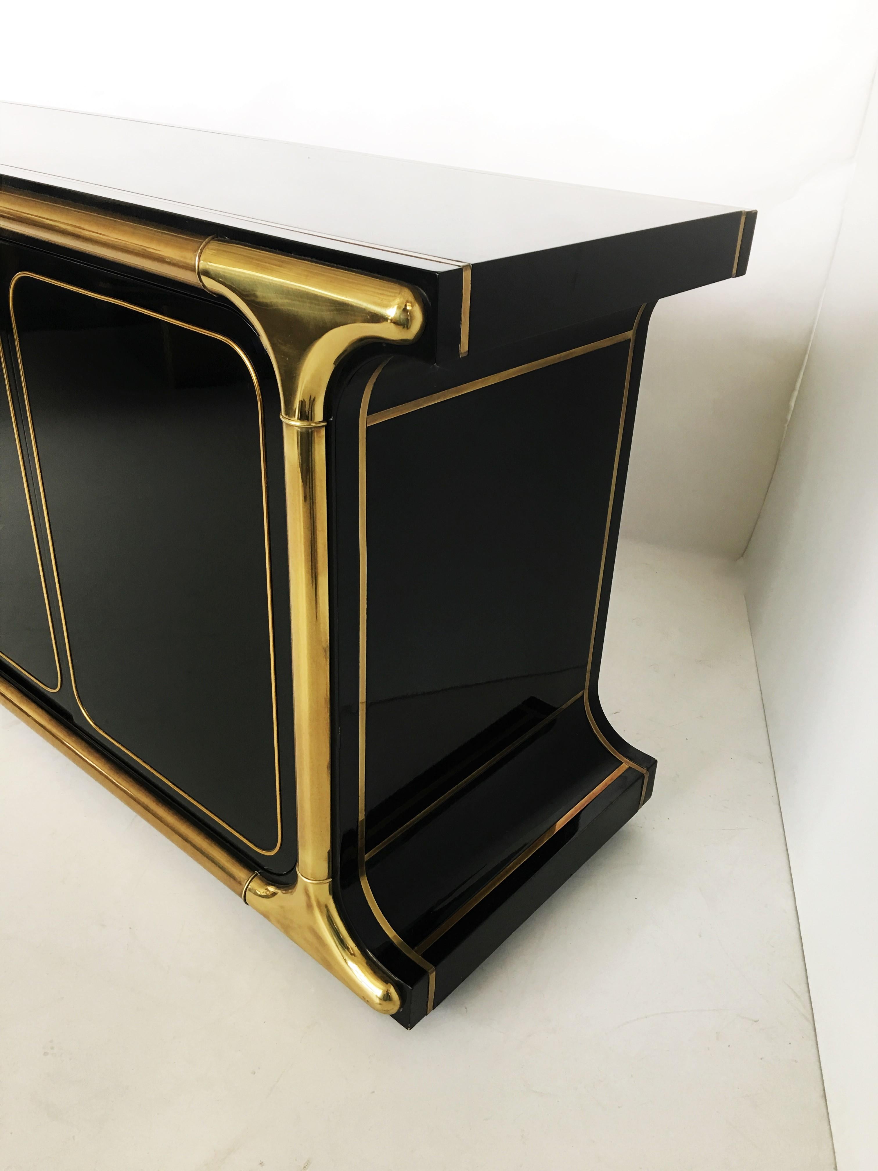 Late 20th Century Glamorous Mastercraft Black Lacquer and Brass Credenza For Sale