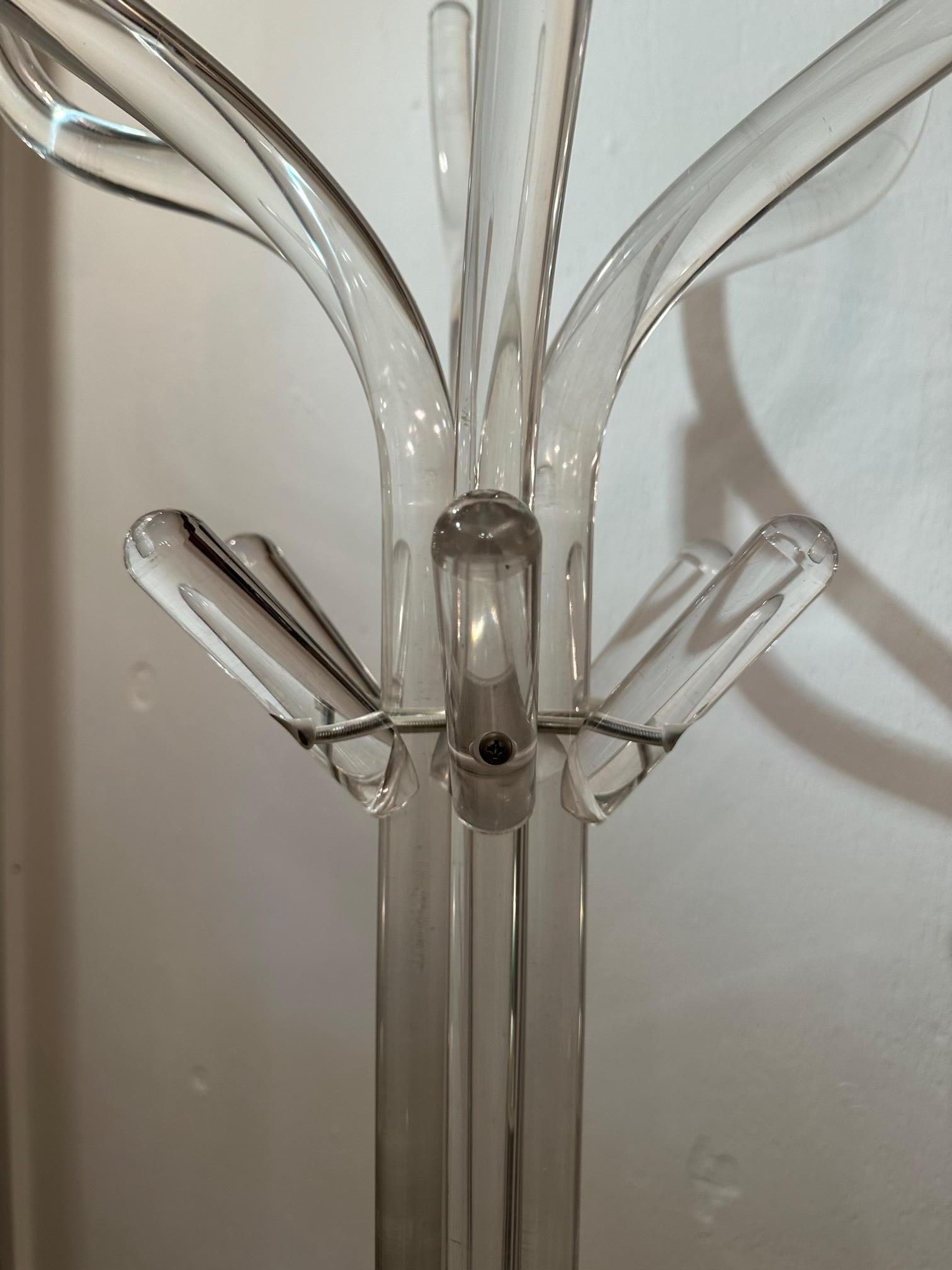 Glamorous tall lucite coat rack having beautiful shape and great function. Solid and heavy so can handle afew coats at a time.
Base 24” diameter
Top 21” diameter.