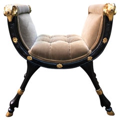 Glamorous Neoclassical Rams Head Ebonized and Gilded Bench
