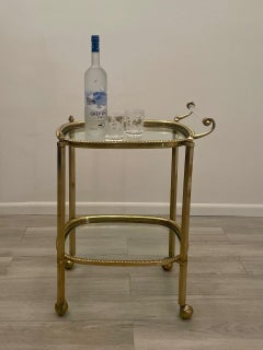Glamorous Oval Brass and Glass Two Tier Bar Cart with Schnazzy Lucite Handle