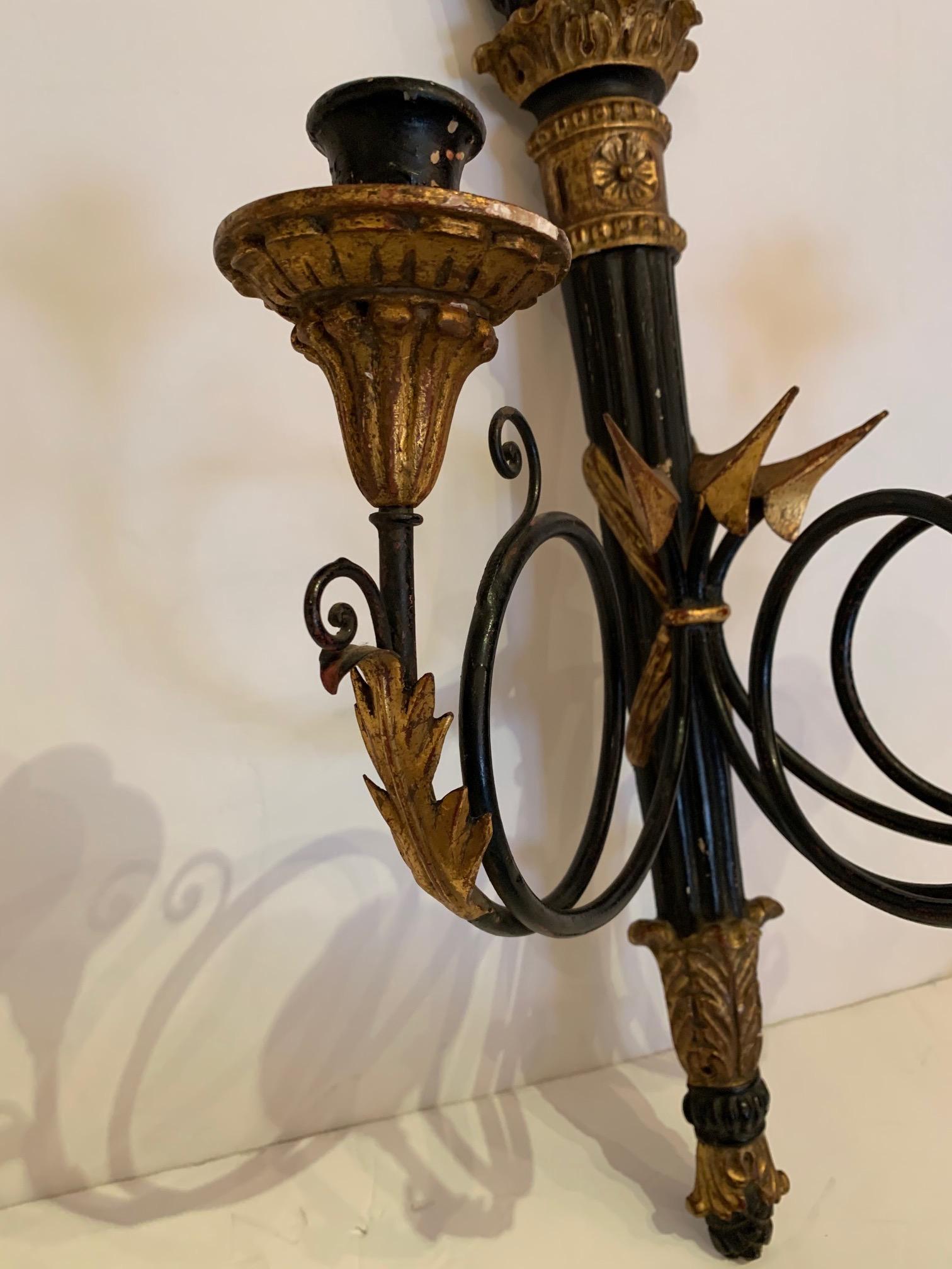Mid-20th Century Glamorous Pair of Black and Gold Italian Neoclassical Sconces For Sale