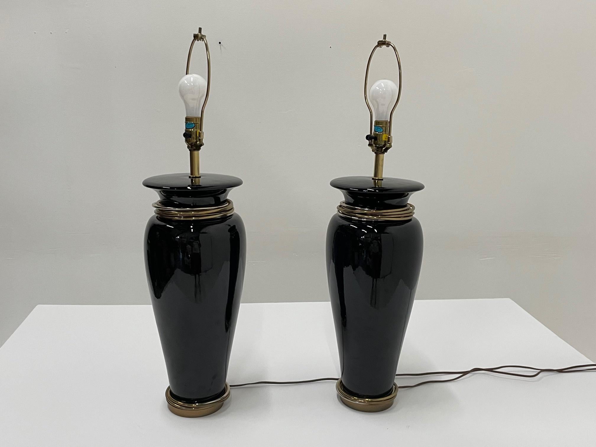 Glamorous Pair of Chapman Black Ceramic Table Lamps with Brass & Steel Rings In Good Condition For Sale In Hopewell, NJ