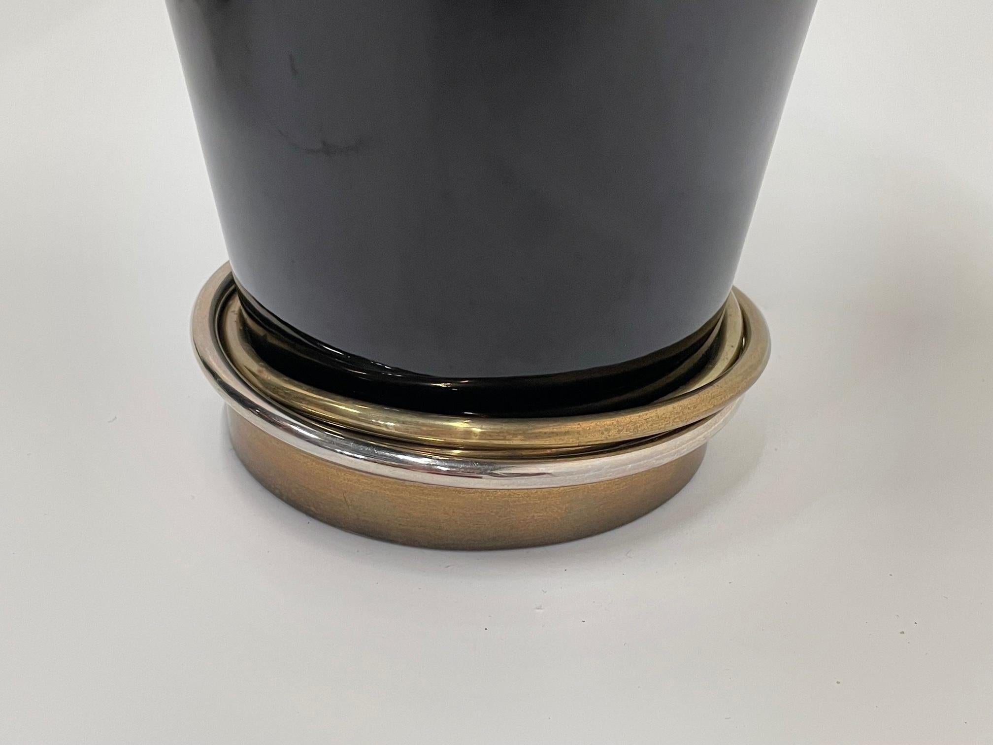 Late 20th Century Glamorous Pair of Chapman Black Ceramic Table Lamps with Brass & Steel Rings For Sale