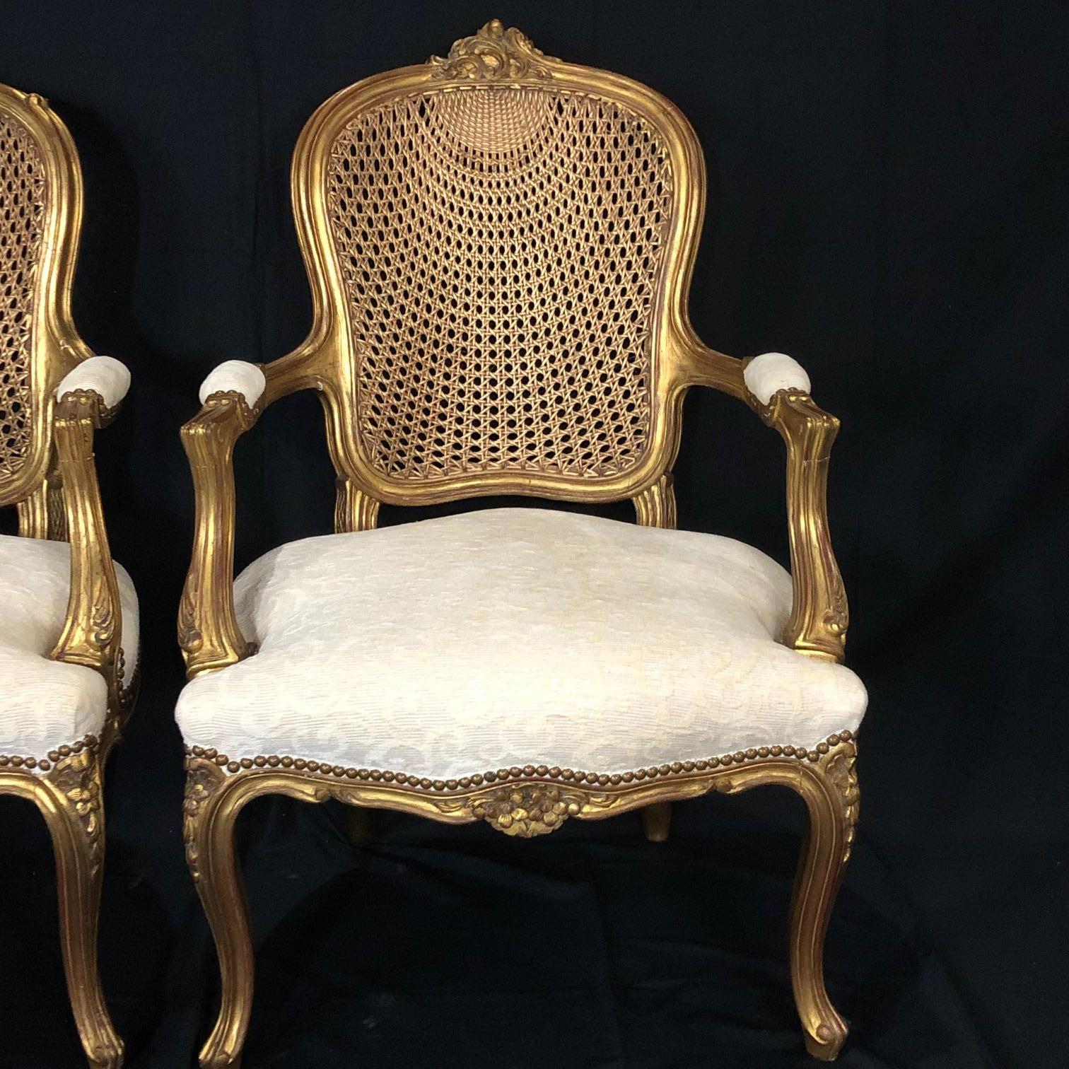 Glamorous Pair of French Louis XV Style Gold Gilt Caned Bergères Armchairs 1