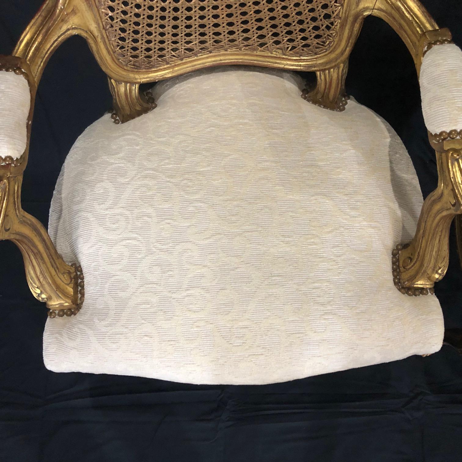 Glamorous Pair of French Louis XV Style Gold Gilt Caned Bergères Armchairs 3