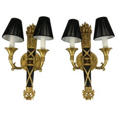 Glamorous Pair of Hollywood Regency Antiqued Brass and Black Painted Sconces