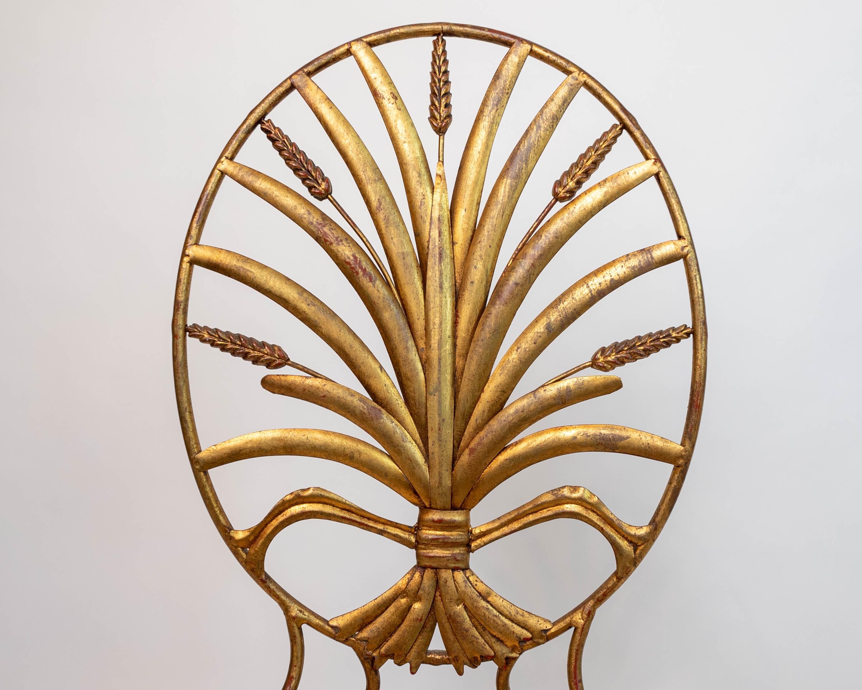Glam pair of Italian vintage wheat sheaf motif side chairs by S. Salvadori having elegant gilded metal detailed oval backs with fanned display of stalks of wheat, slender legs and x stretchers.