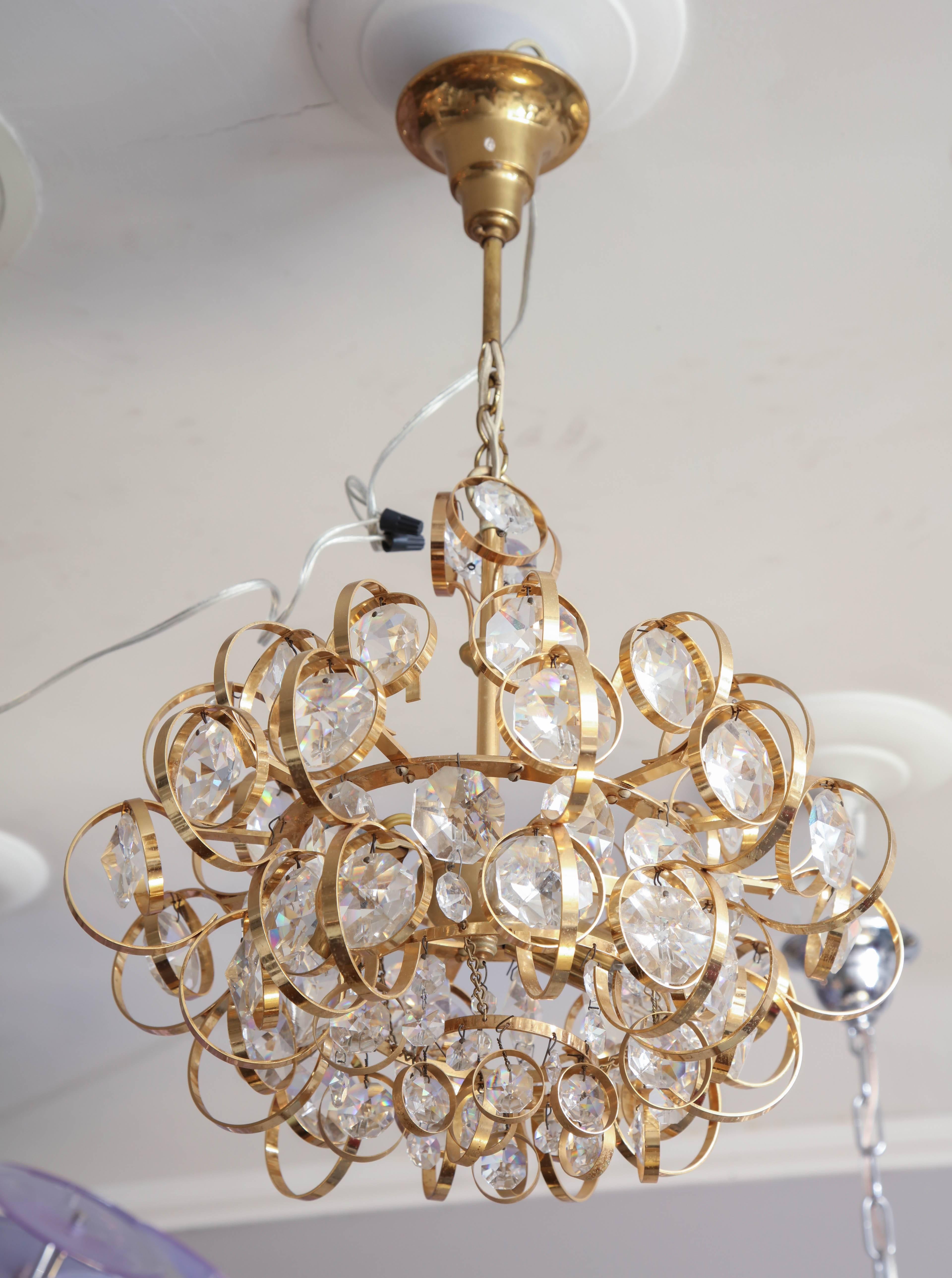 Glamorous petite vintage Palwa chandelier. It has 3 candelabra sockets and is in excellent condition with minimum wear that is consistent with its age and use.