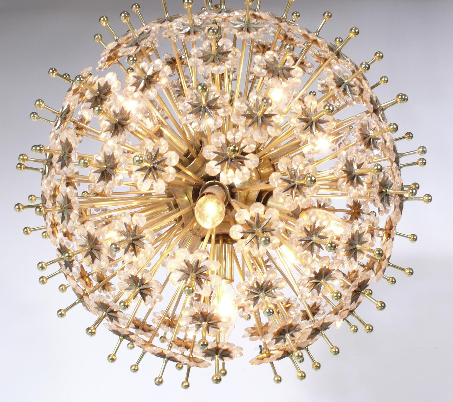 Glamorous snowflake sputnik chandelier, designed by Emil Stejnar, Austria, circa 1960s. It looks incredible when lit, as the light reflects and glows from all of it's crystals. It has been rewired and is ready to mount.